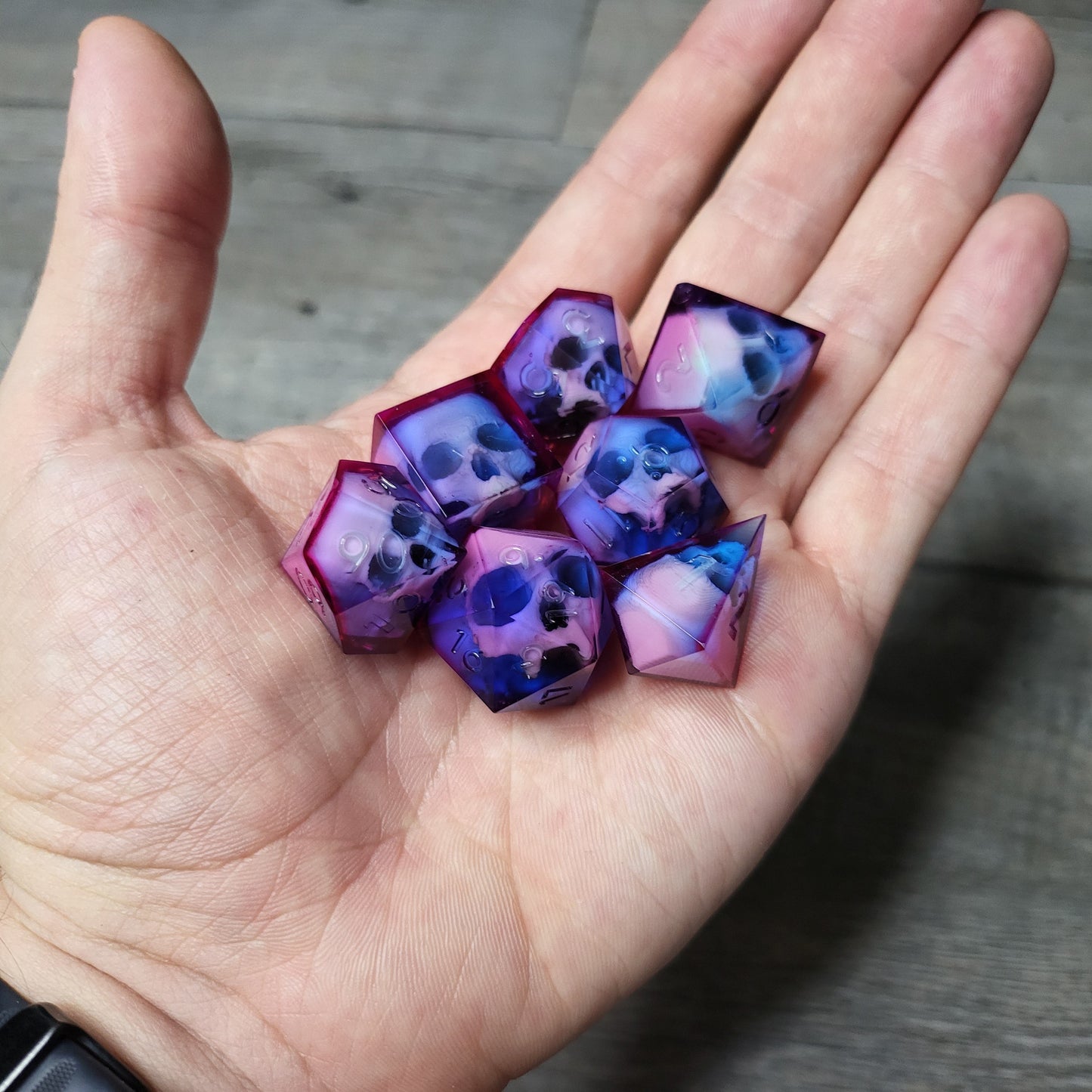 Dice set with 7 pieces with skull inside for role-playing games for Dungeons and Dragons