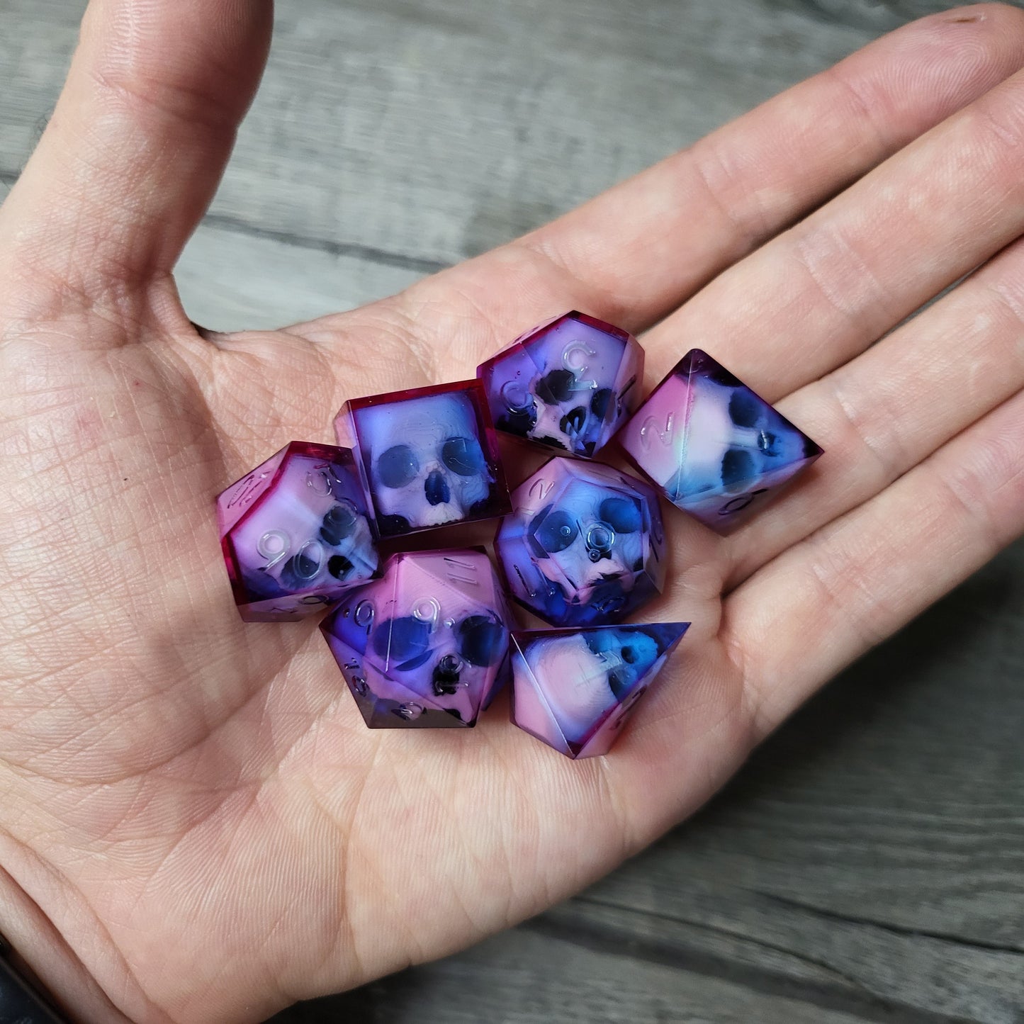 Dice set with 7 pieces with skull inside for role-playing games for Dungeons and Dragons