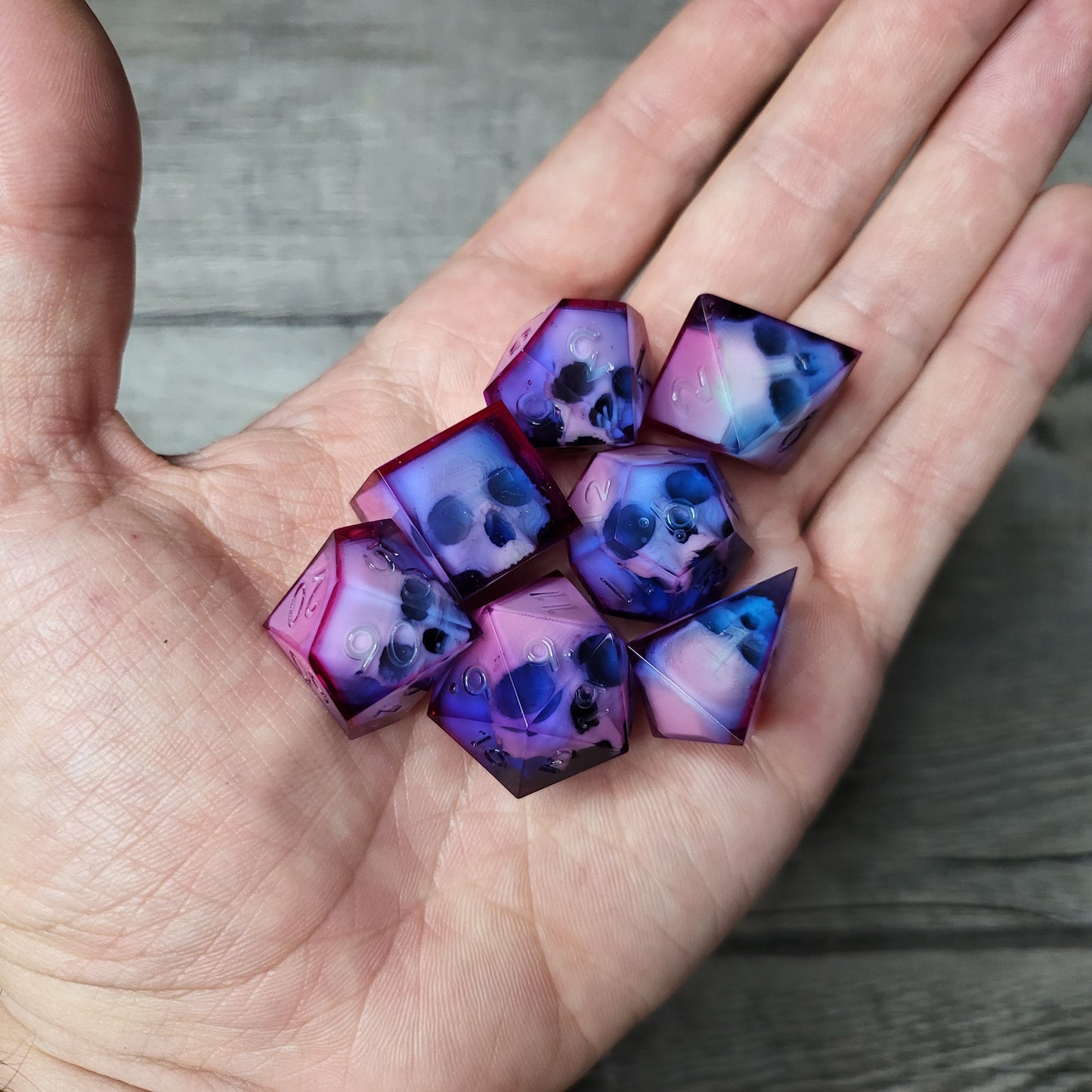 Dice set with 7 pieces with skull inside for role-playing games for Dungeons and Dragons