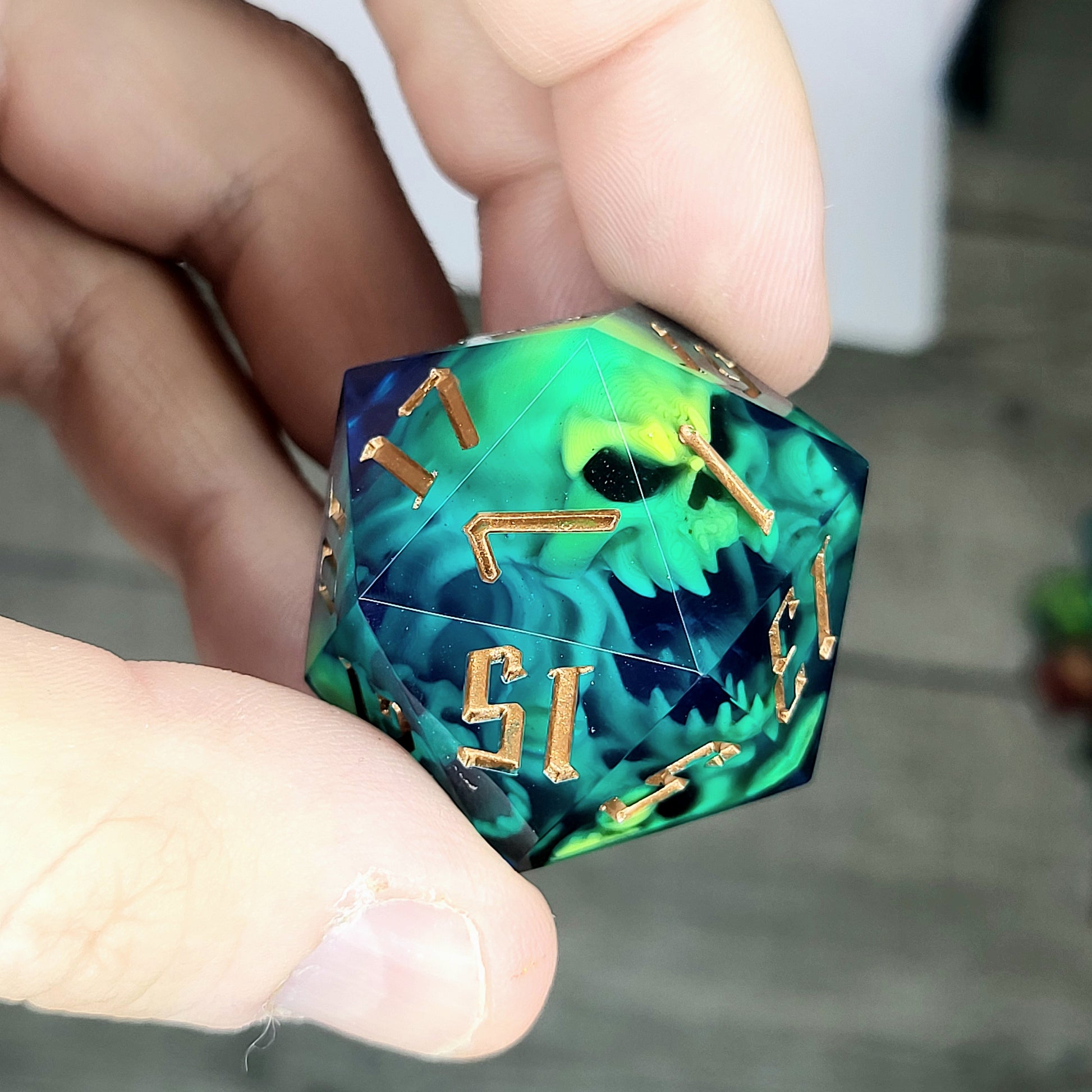 D20 dice in 33 mm format with skull inside for role-playing games for Dungeons and Dragons