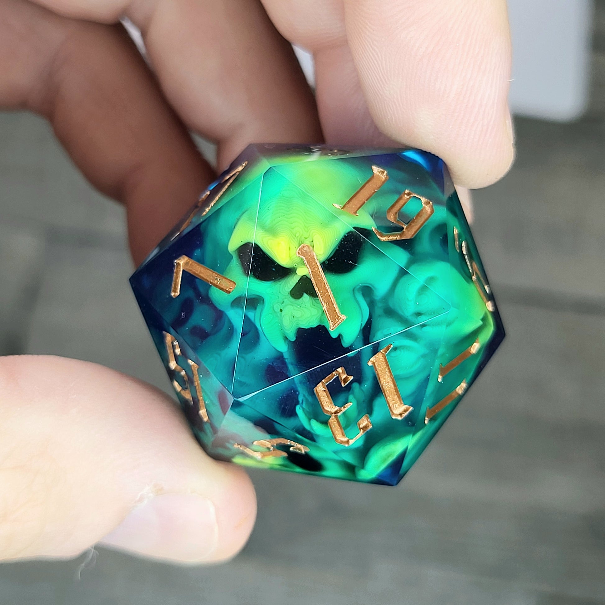 D20 dice in 33 mm format with skull inside for role-playing games for Dungeons and Dragons