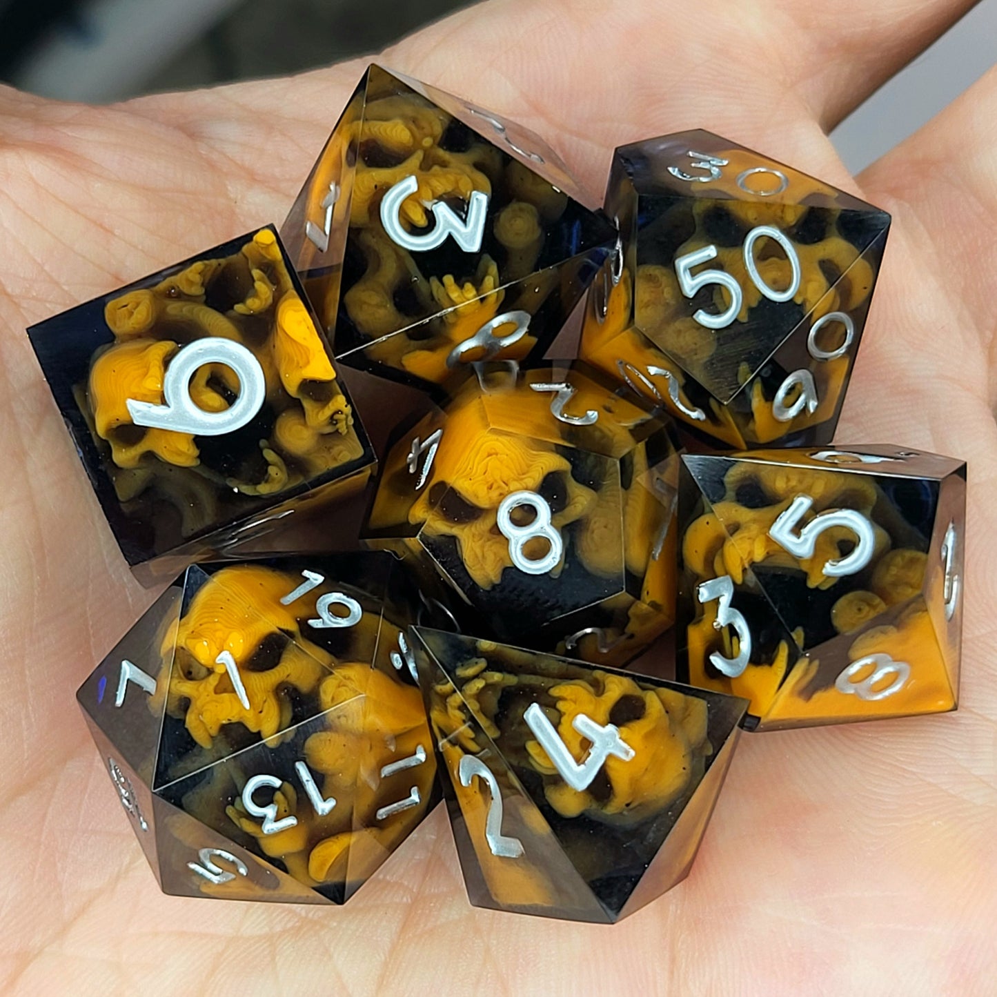 Dice set with orange spirit inside and black resin for play dnd , dungeons and dragons