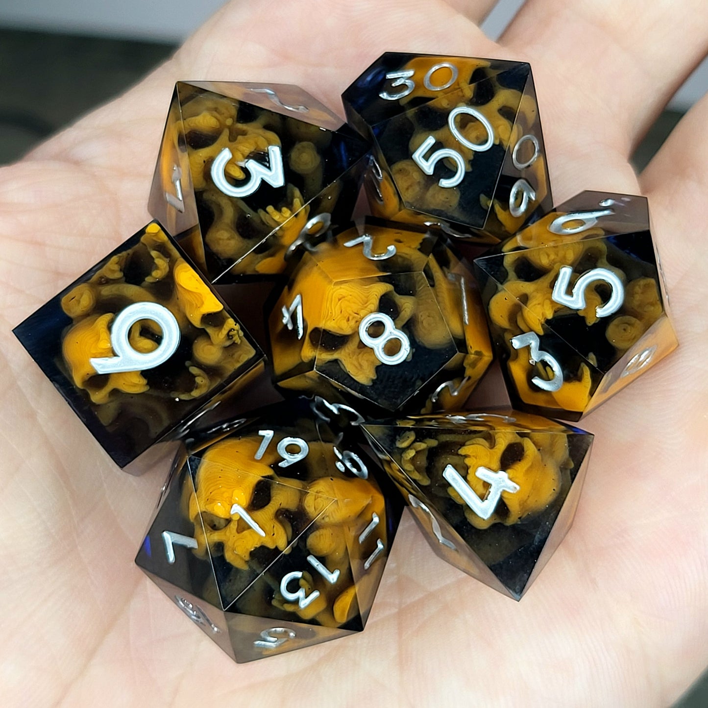Dice set with orange spirit inside and black resin for play dnd , dungeons and dragons