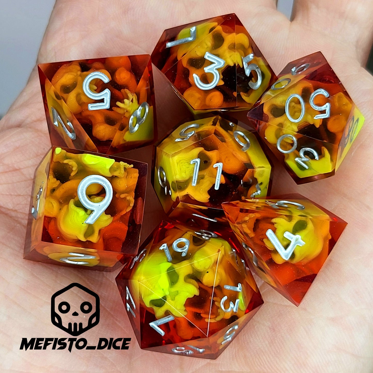 Dice set with green spirit inside and silver numbers for play dnd , dungeons and dragons