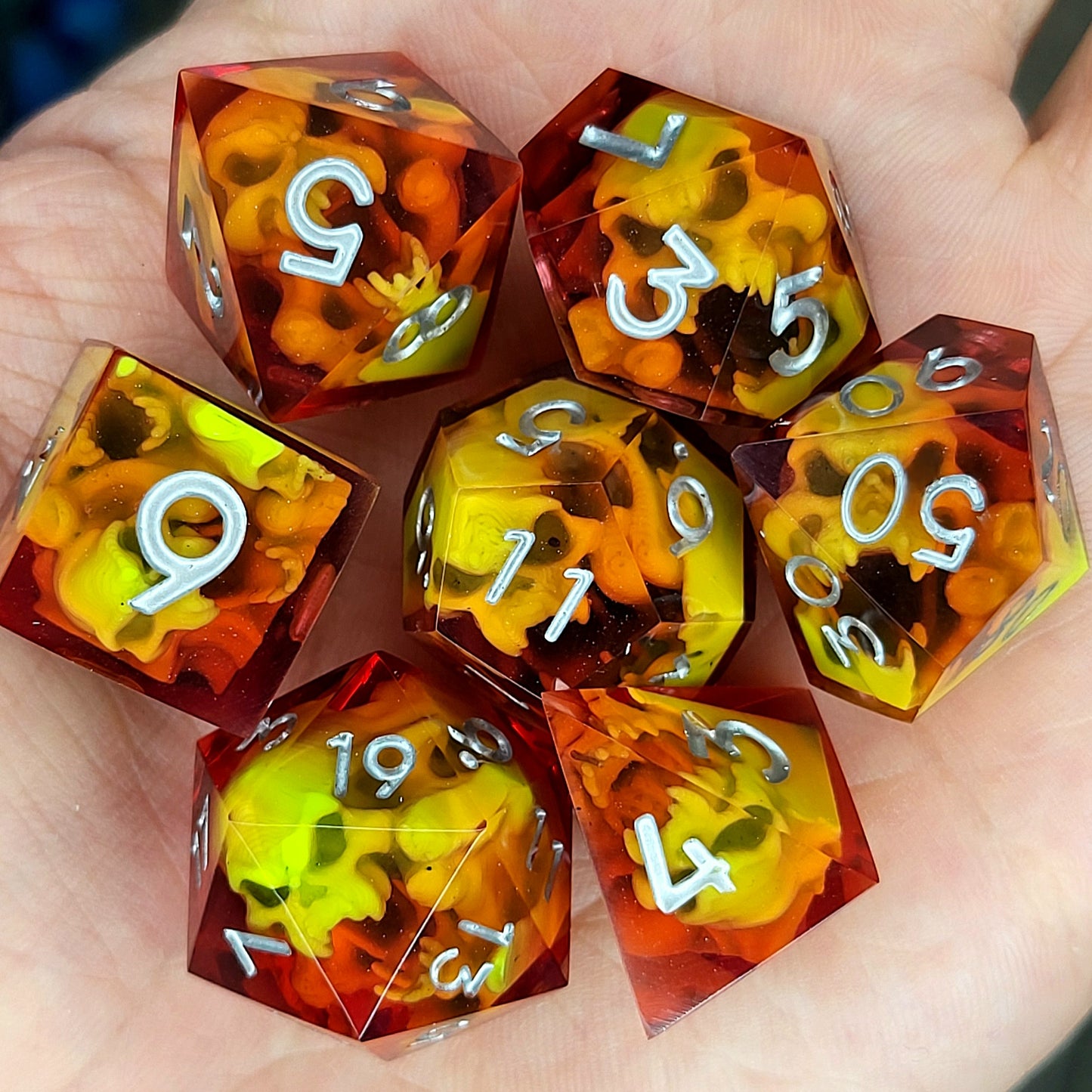 Dice set with green spirit inside and silver numbers for play dnd , dungeons and dragons