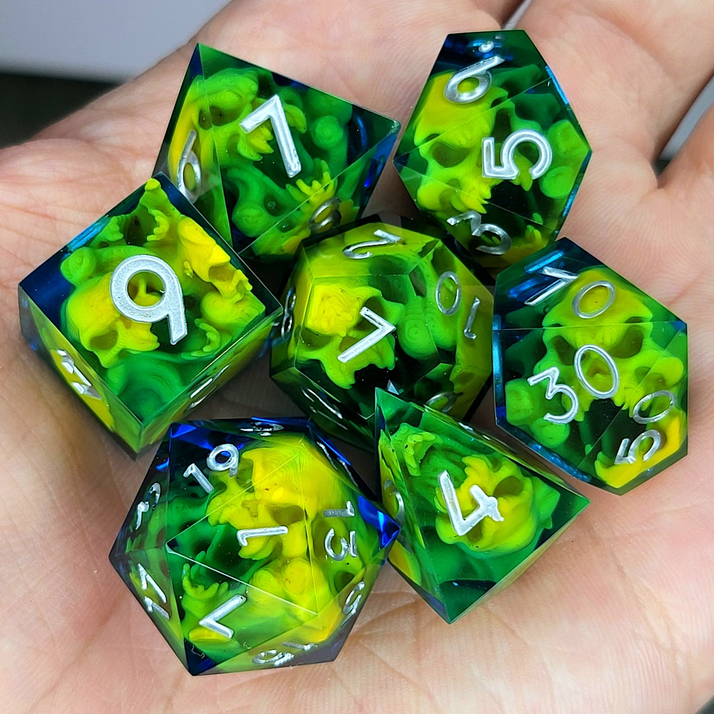 Dice set with yellow spirit inside and silver numbers for play dnd , dungeons and dragons