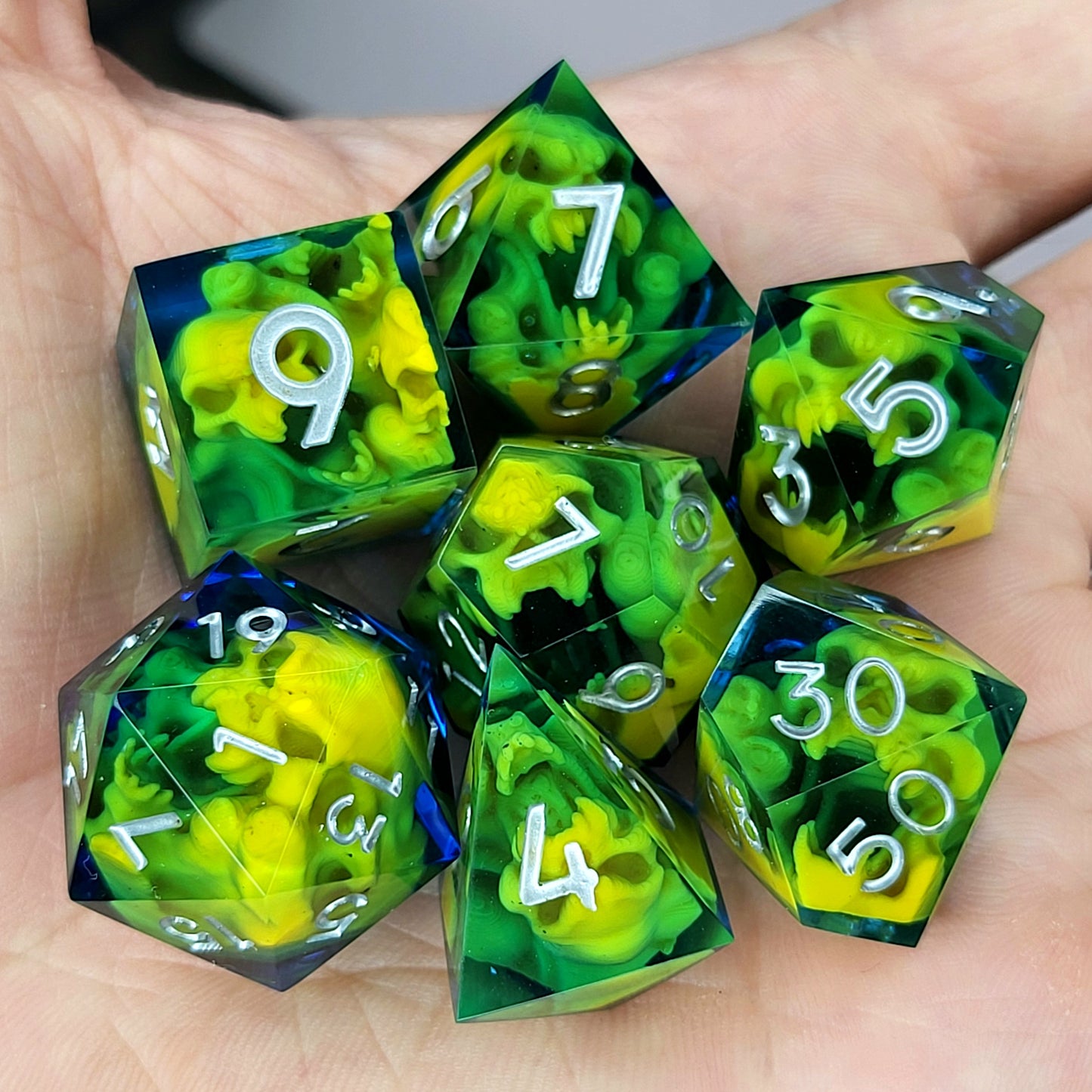Dice set with yellow spirit inside and silver numbers for play dnd , dungeons and dragons