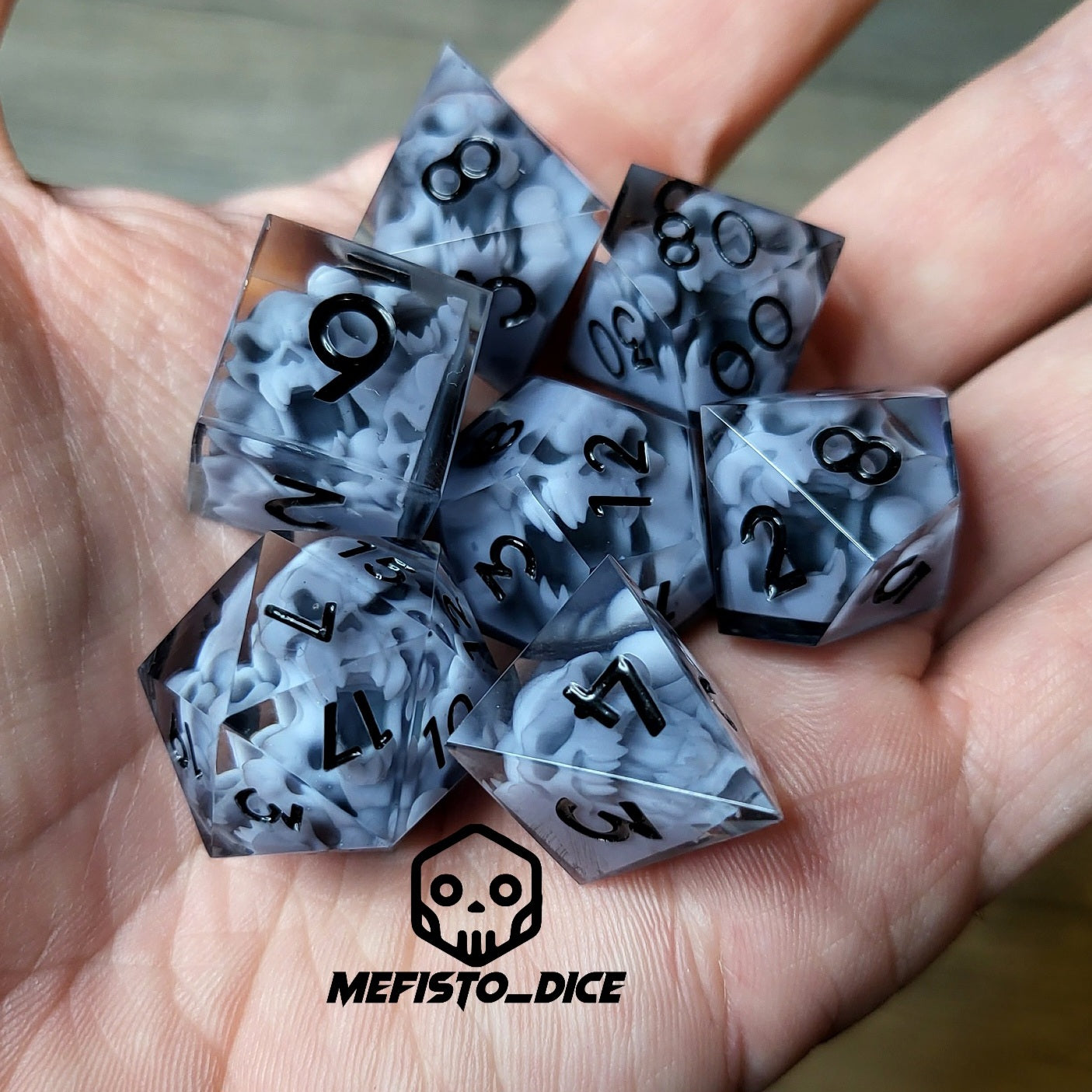 Dice set with 7 pieces with skull inside in spirit theme for role-playing games for Dungeons and Dragons