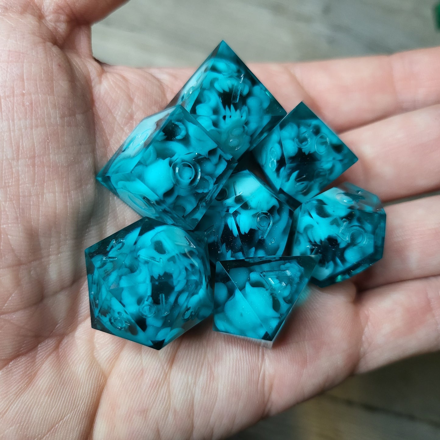Dice set with 7 pieces with skull inside in spirit theme for role-playing games for Dungeons and Dragons