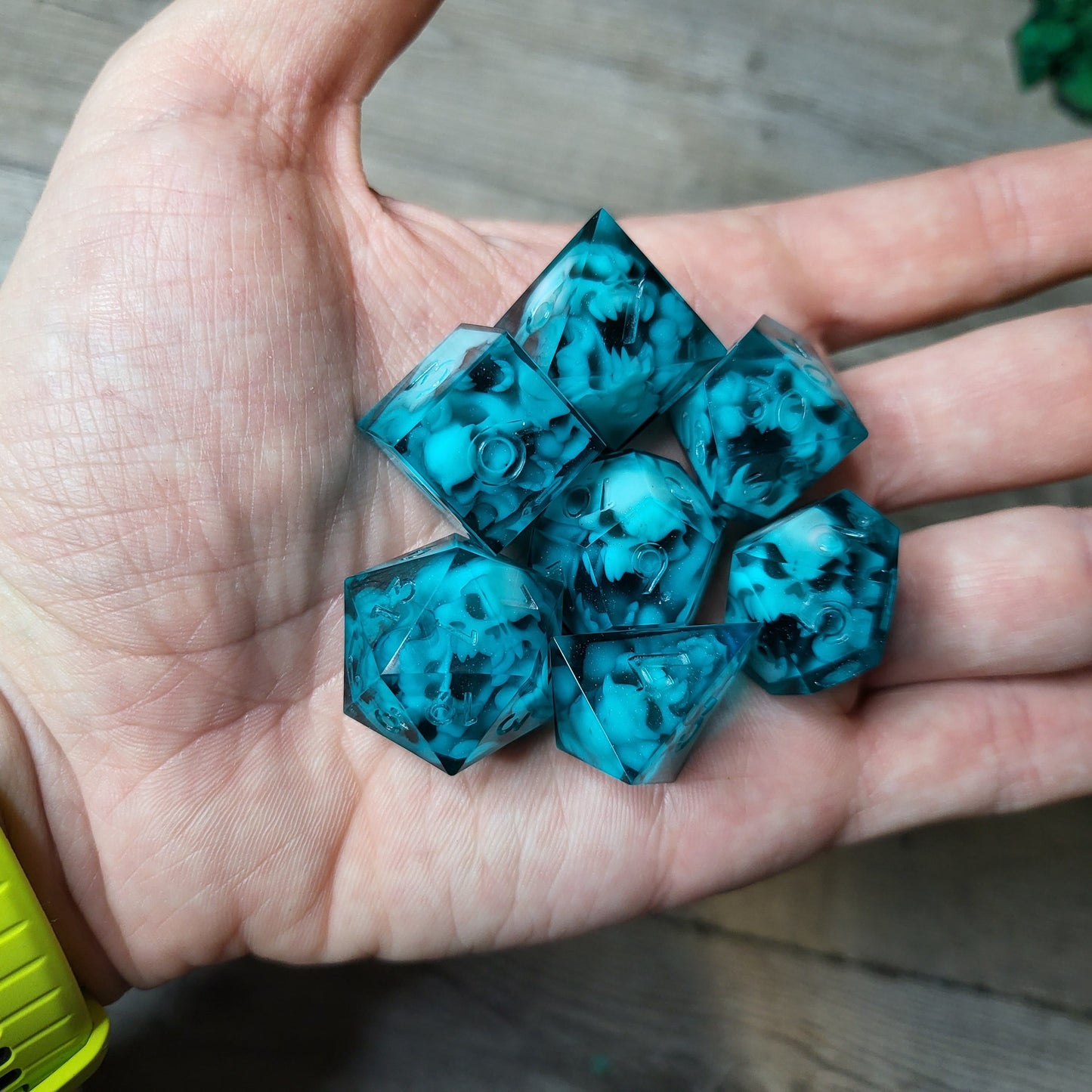Dice set with 7 pieces with skull inside in spirit theme for role-playing games for Dungeons and Dragons