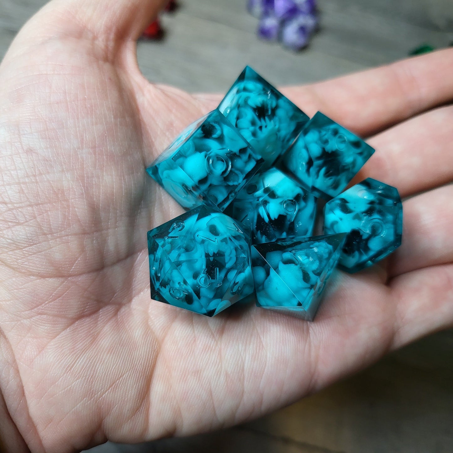 Dice set with 7 pieces with skull inside in spirit theme for role-playing games for Dungeons and Dragons