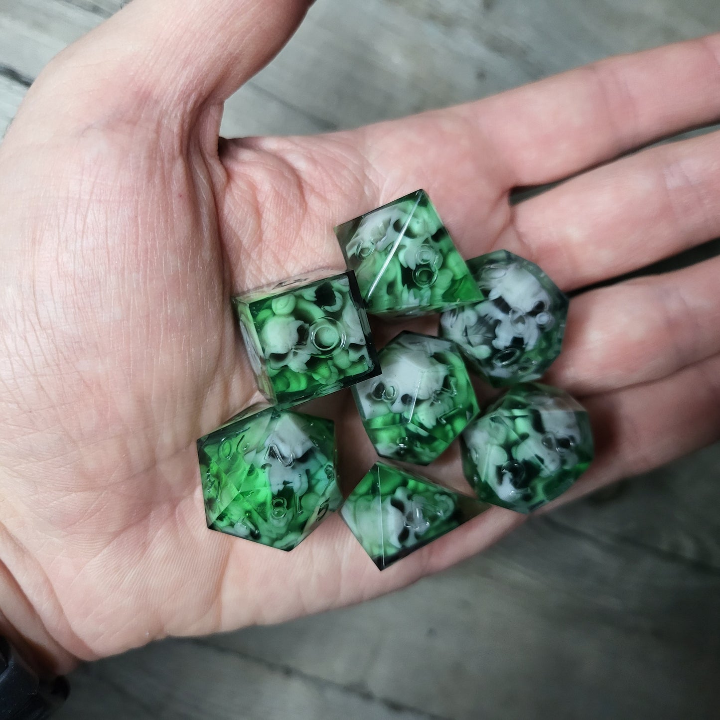 Dice set with 7 pieces with skull inside in spirit theme for role-playing games for Dungeons and Dragons