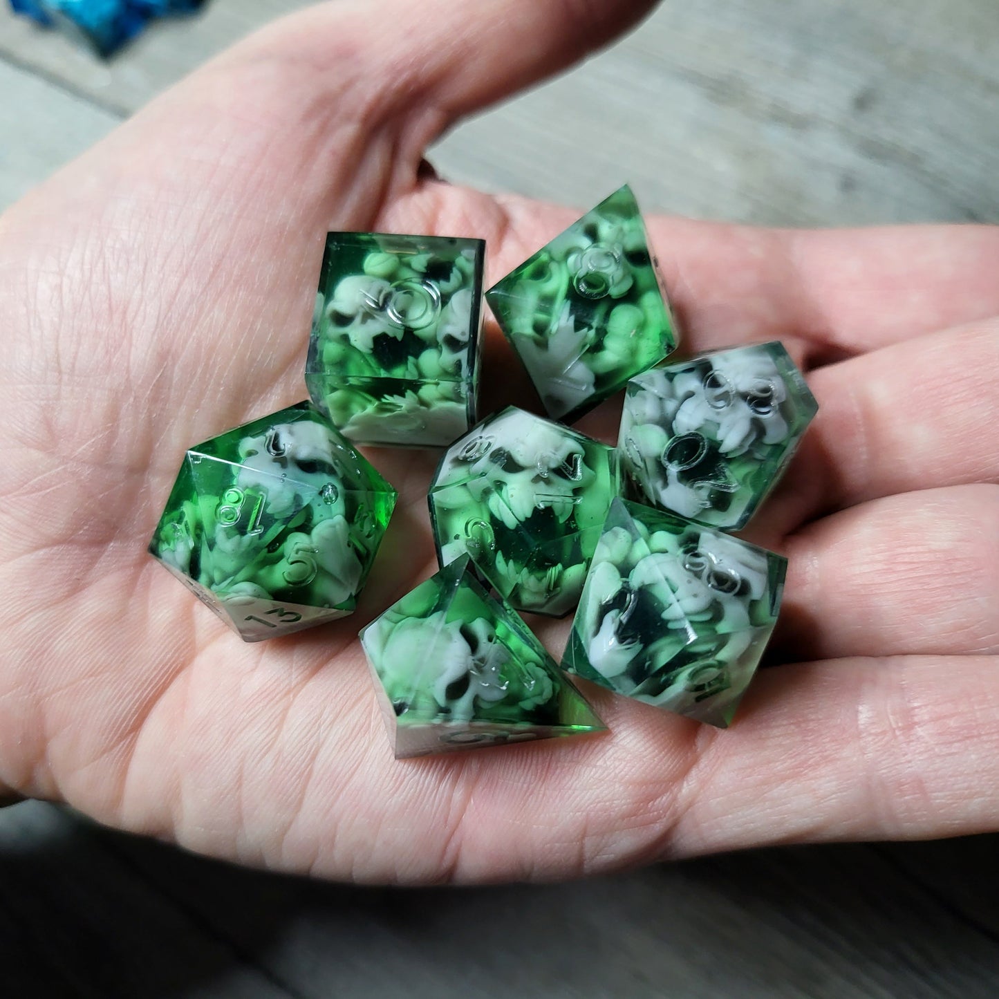 Dice set with 7 pieces with skull inside in spirit theme for role-playing games for Dungeons and Dragons