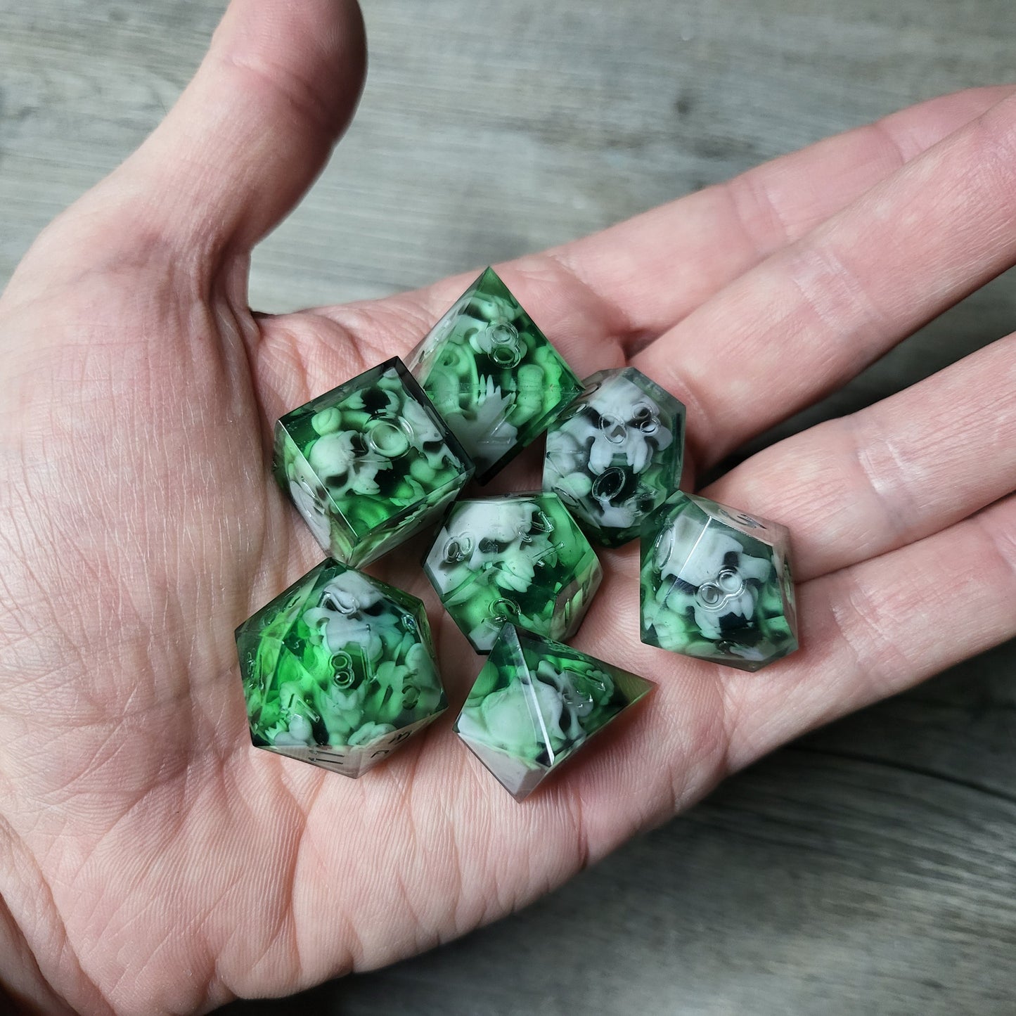 Dice set with 7 pieces with skull inside in spirit theme for role-playing games for Dungeons and Dragons