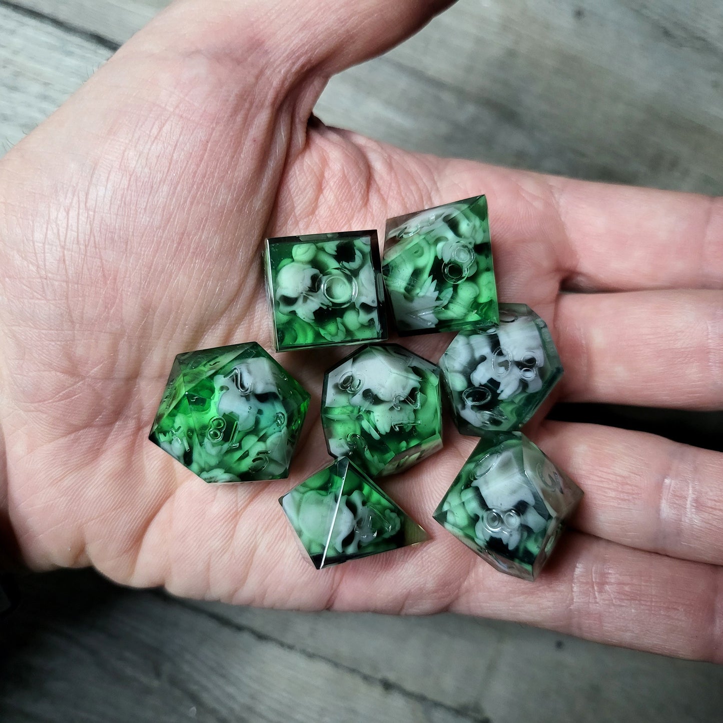 Dice set with 7 pieces with skull inside in spirit theme for role-playing games for Dungeons and Dragons