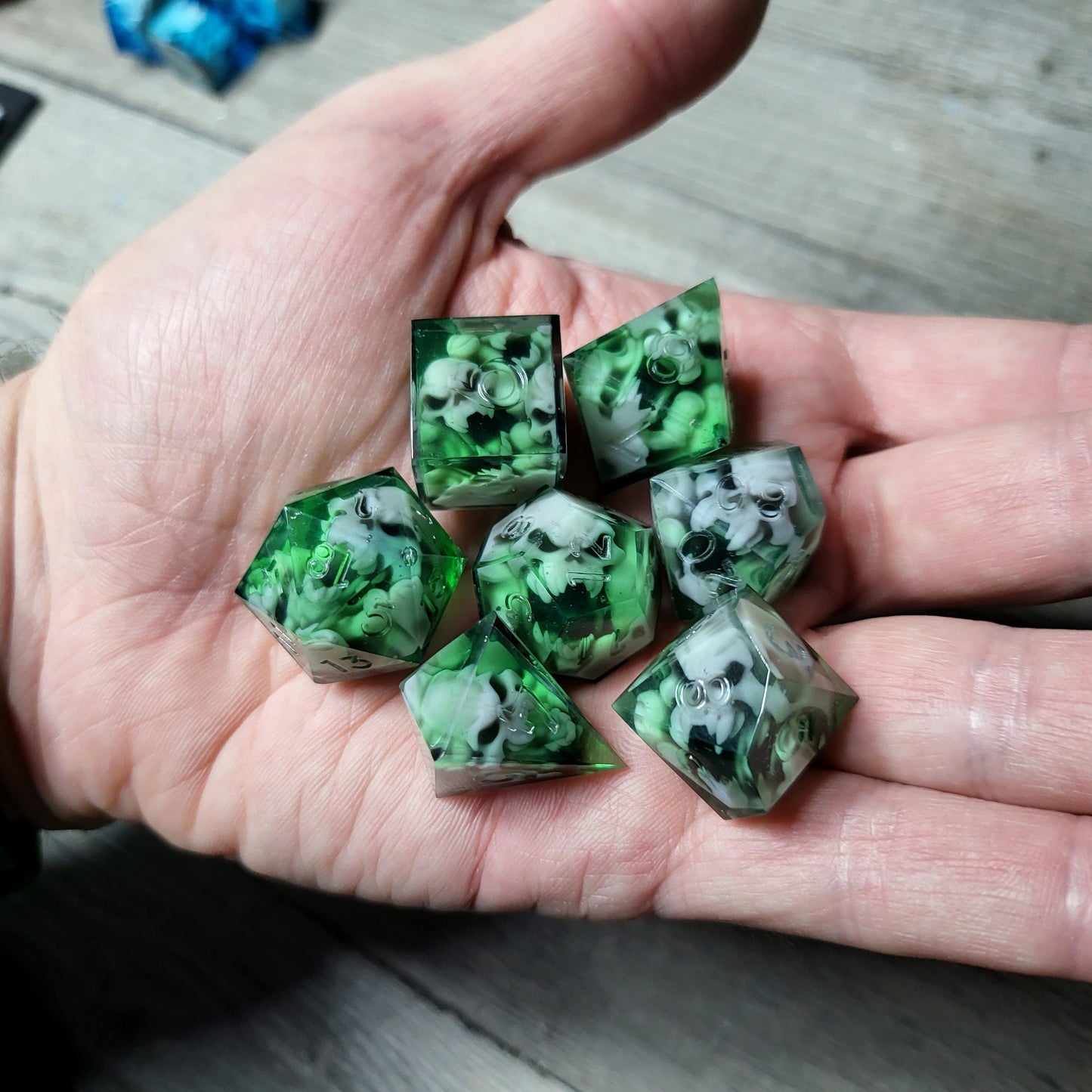 Dice set with 7 pieces with skull inside in spirit theme for role-playing games for Dungeons and Dragons
