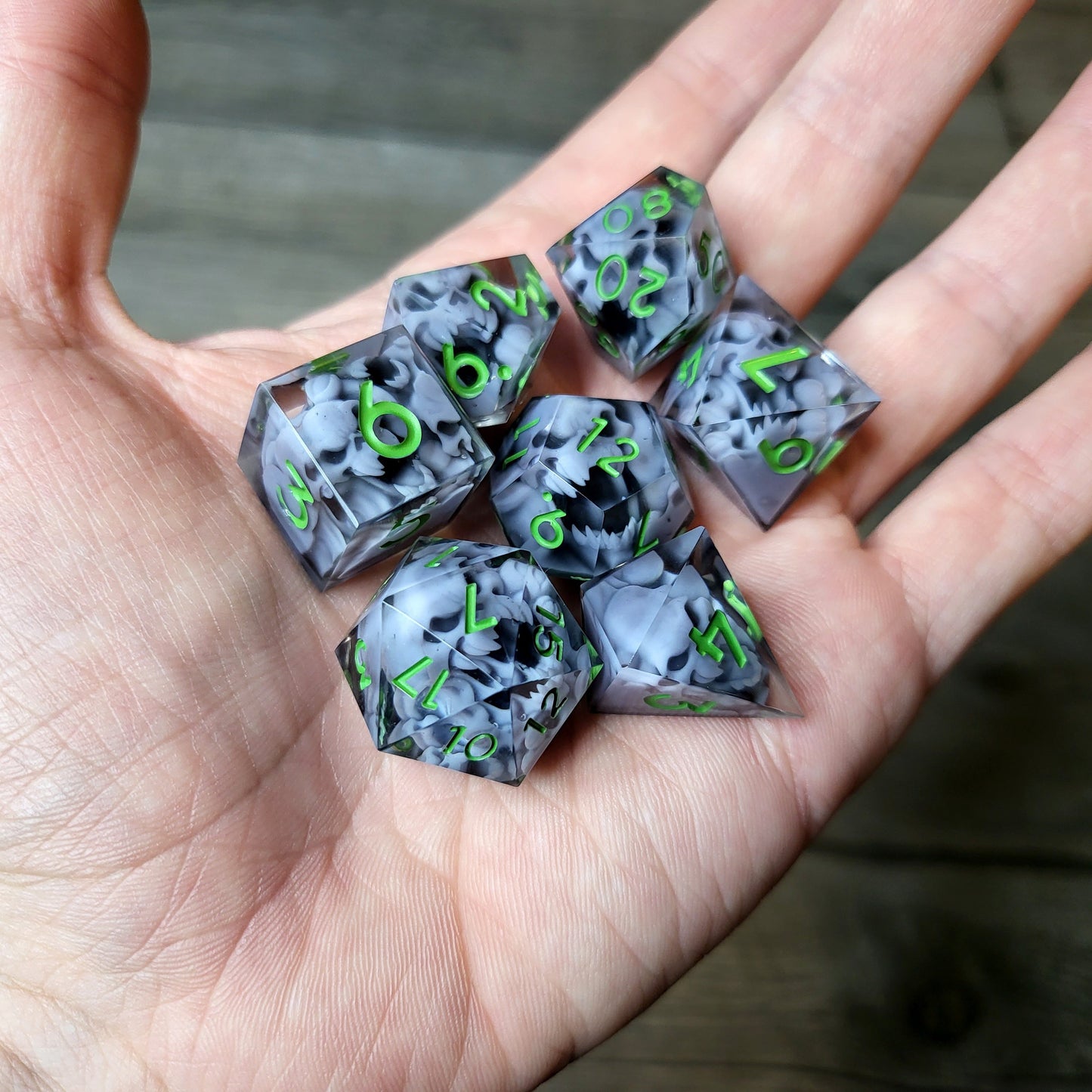 Dice set with 7 pieces with skull inside in spirit theme for role-playing games for Dungeons and Dragons