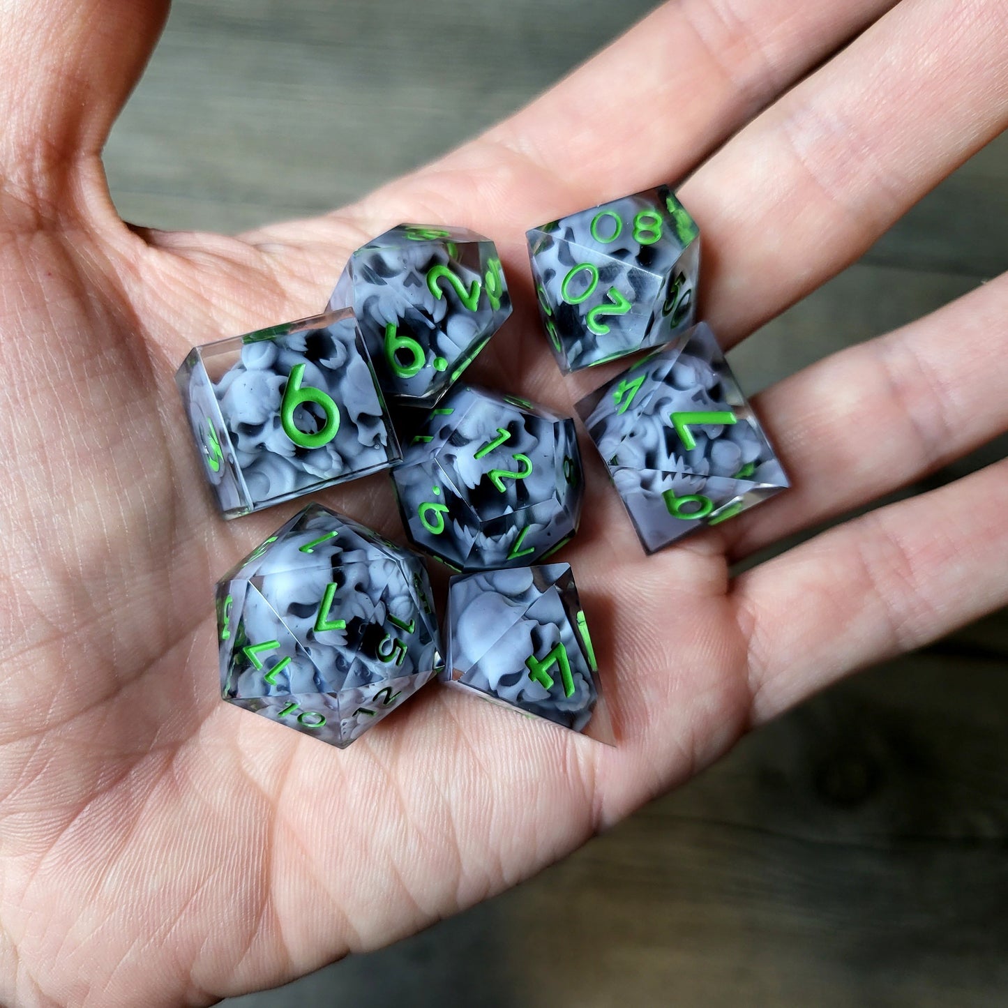 Dice set with 7 pieces with skull inside in spirit theme for role-playing games for Dungeons and Dragons