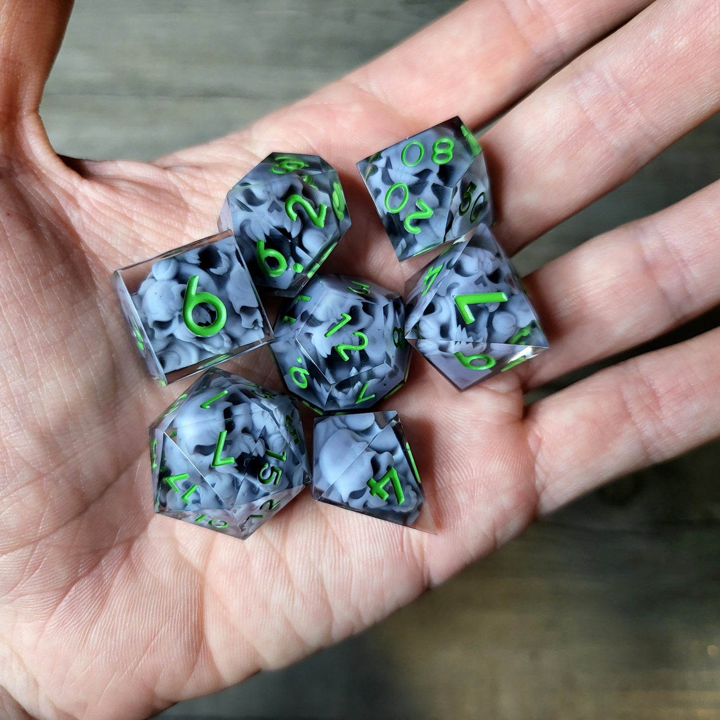 Dice set with 7 pieces with skull inside in spirit theme for role-playing games for Dungeons and Dragons