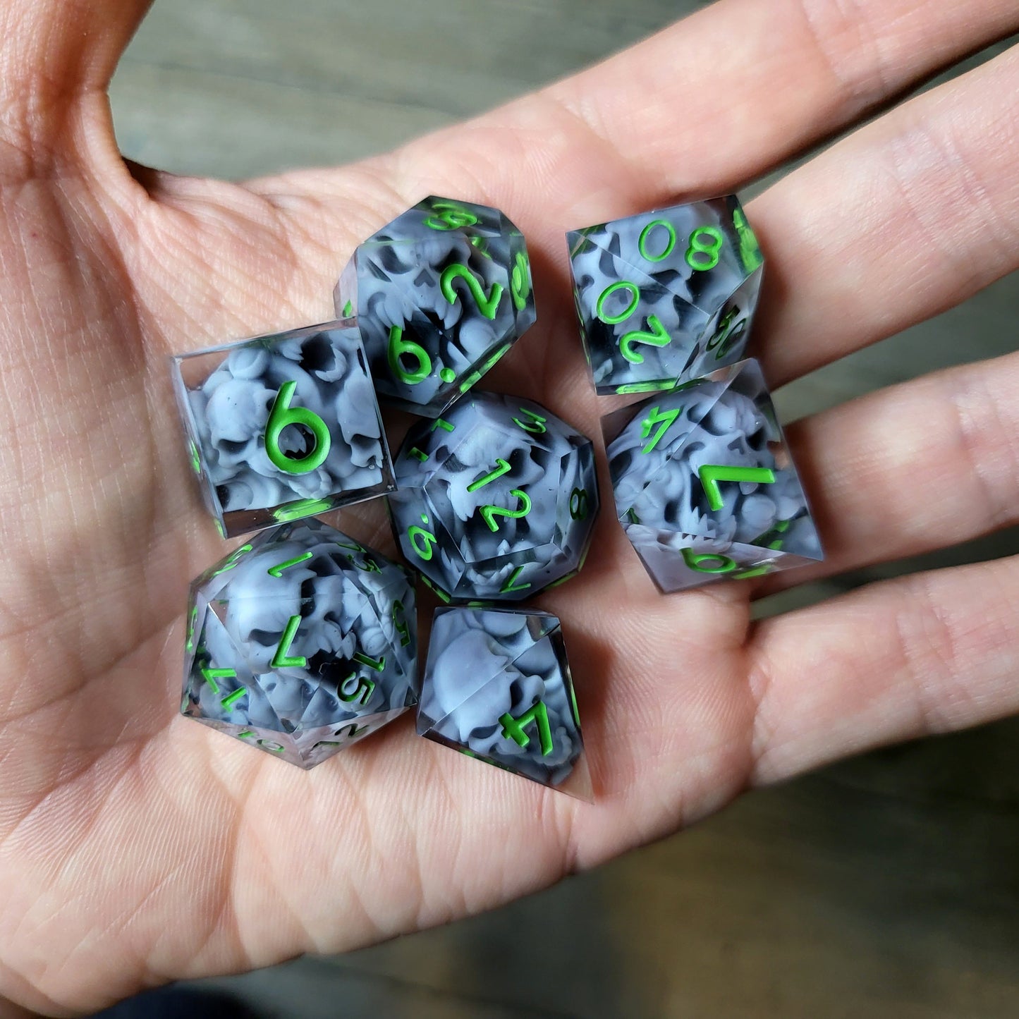 Dice set with 7 pieces with skull inside in spirit theme for role-playing games for Dungeons and Dragons