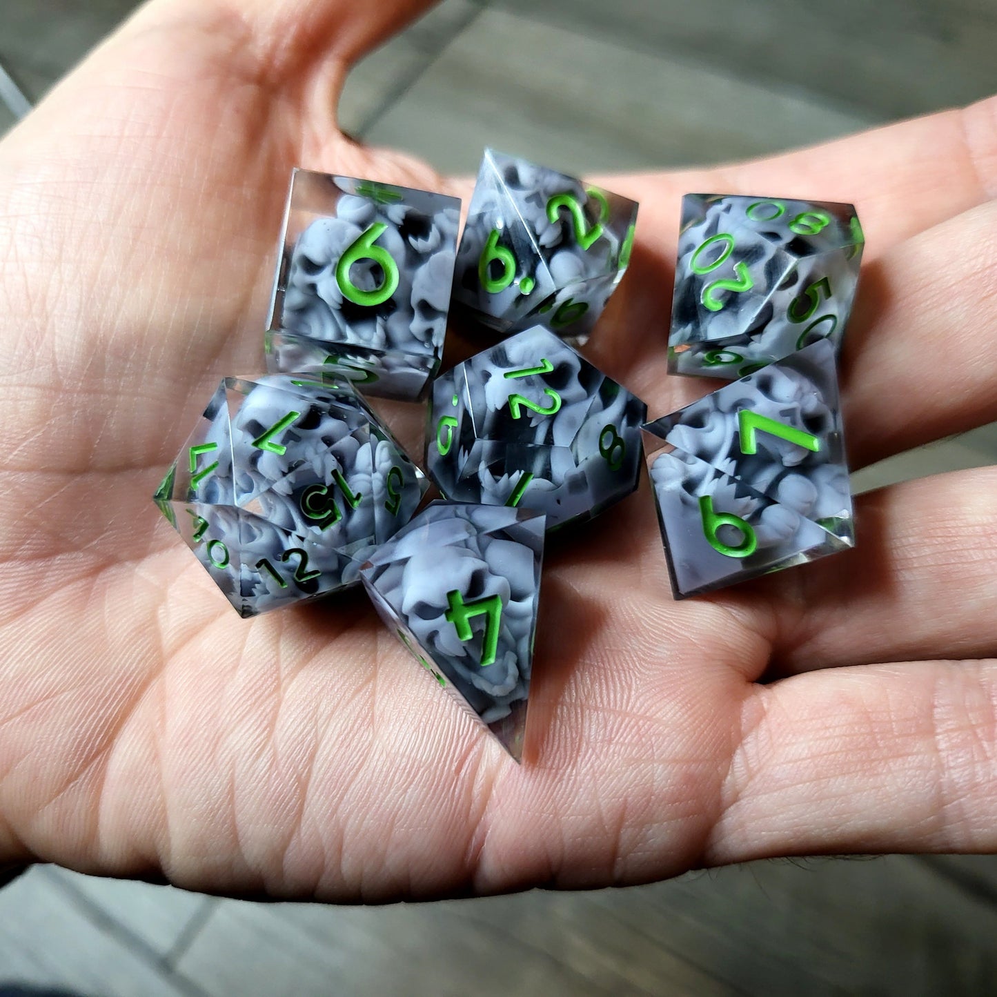 Dice set with 7 pieces with skull inside in spirit theme for role-playing games for Dungeons and Dragons