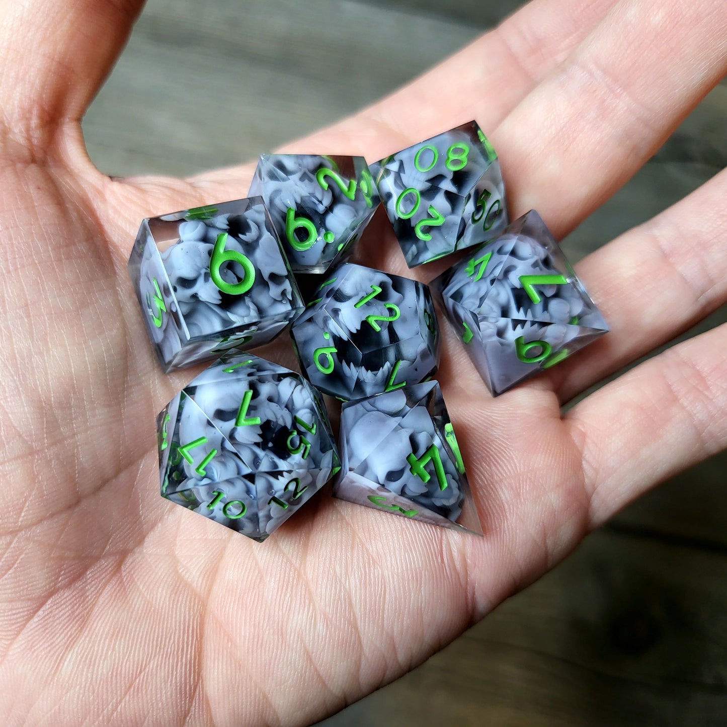 Dice set with 7 pieces with skull inside in spirit theme for role-playing games for Dungeons and Dragons