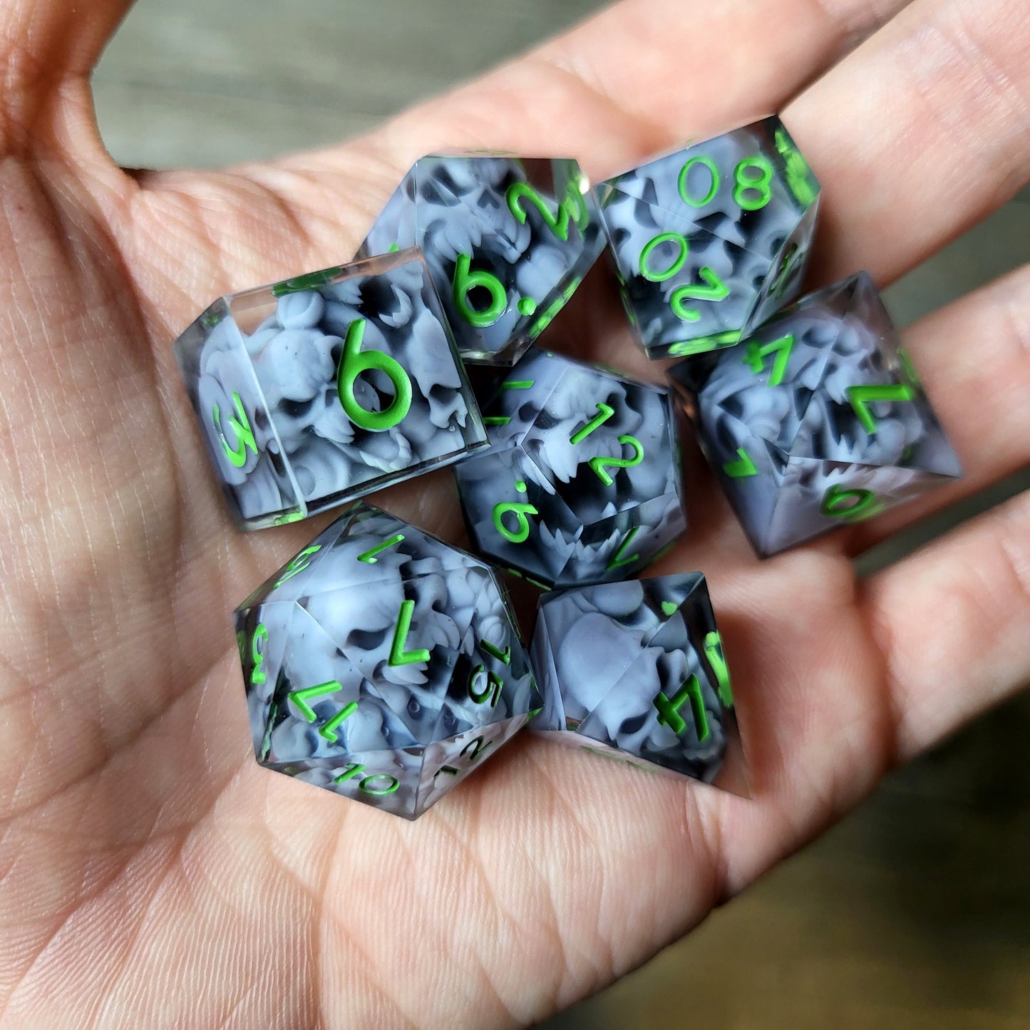 Dice set with 7 pieces with skull inside in spirit theme for role-playing games for Dungeons and Dragons
