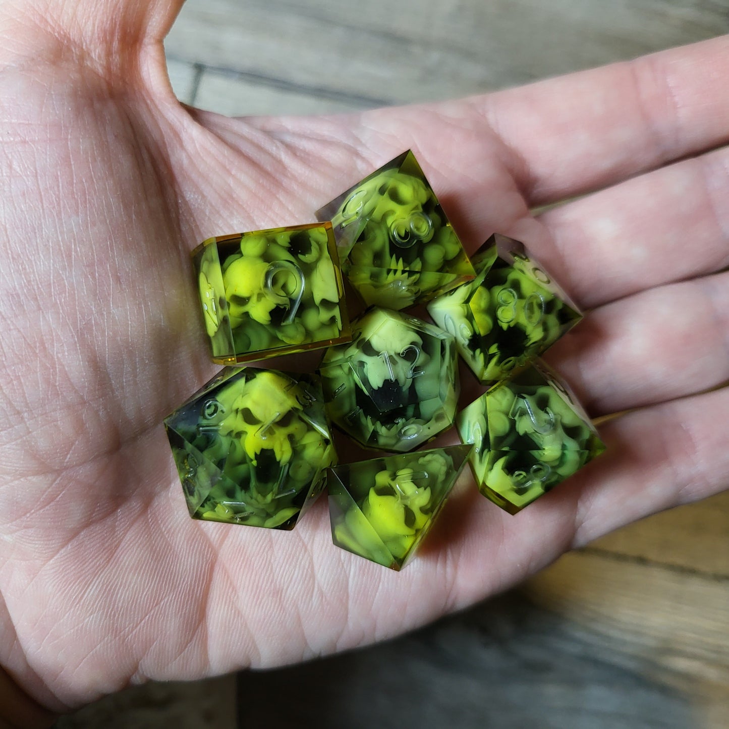 Dice set with 7 pieces with skull inside in spirit theme for role-playing games for Dungeons and Dragons