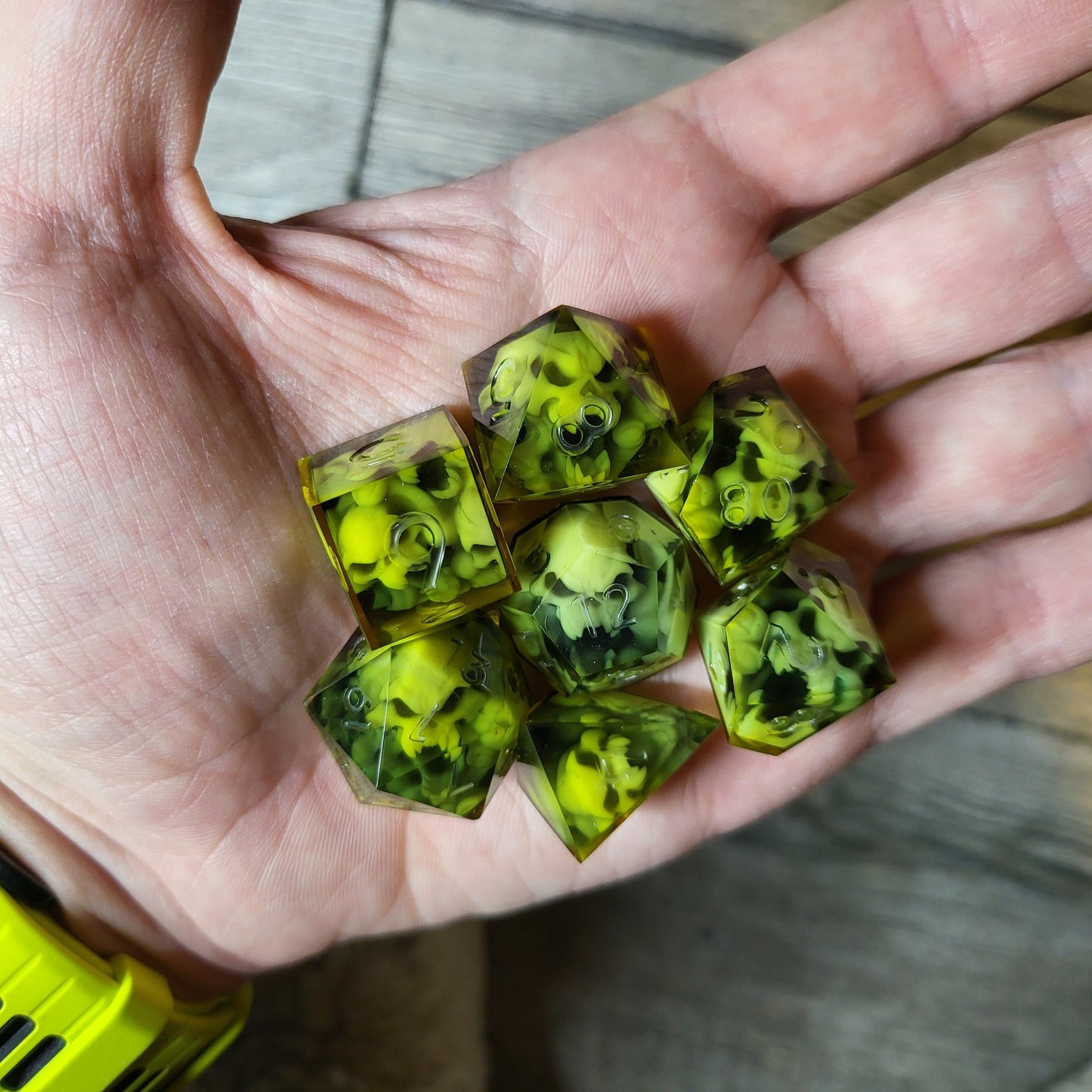 Dice set with 7 pieces with skull inside in spirit theme for role-playing games for Dungeons and Dragons