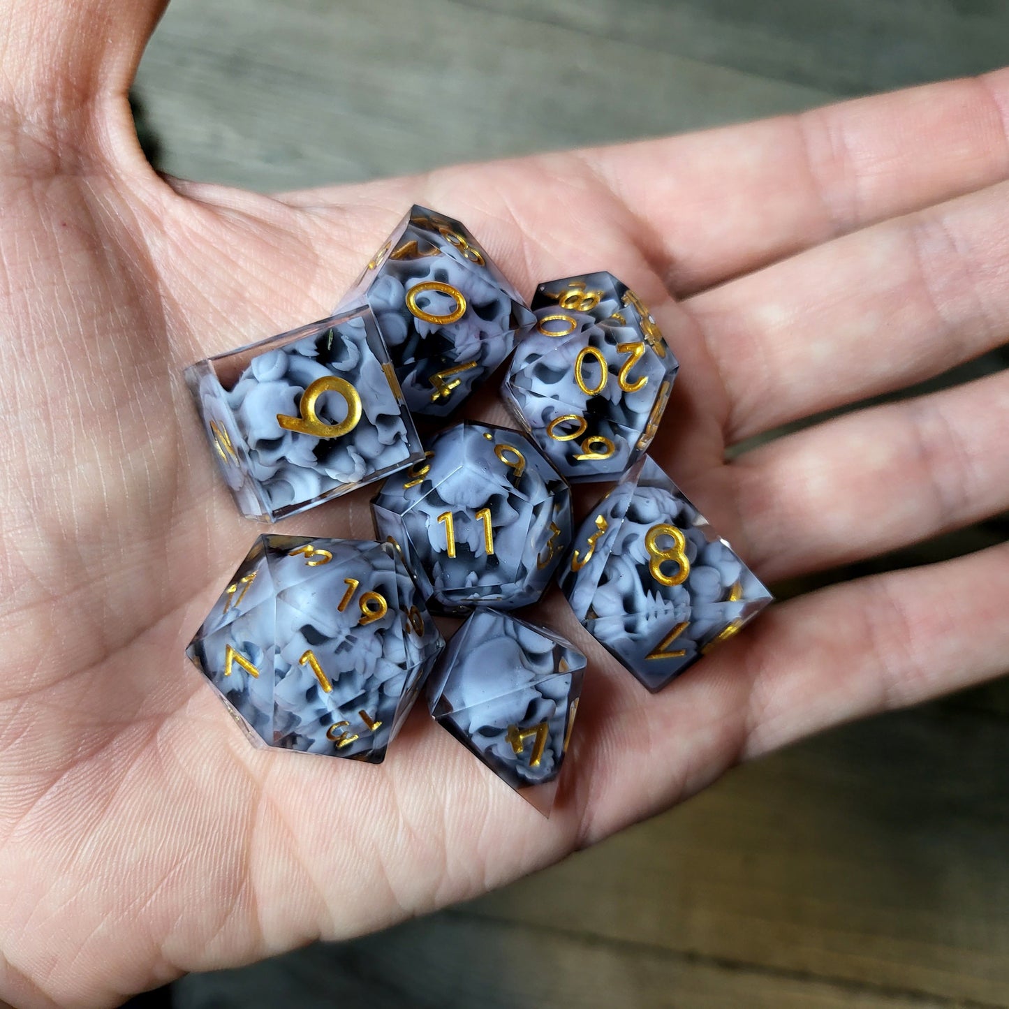 Dice set with 7 pieces with skull inside in spirit theme for role-playing games for Dungeons and Dragons