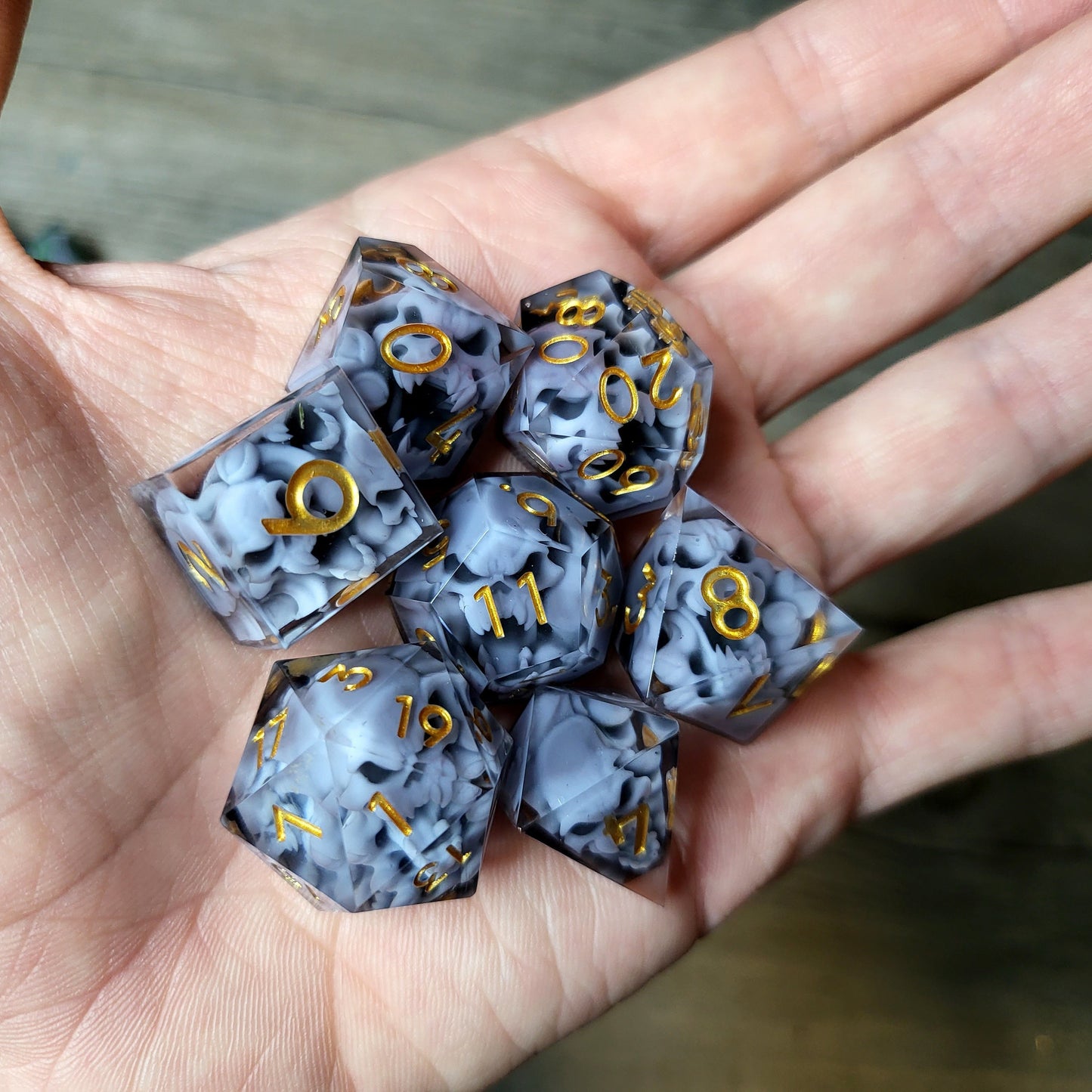 Dice set with 7 pieces with skull inside in spirit theme for role-playing games for Dungeons and Dragons