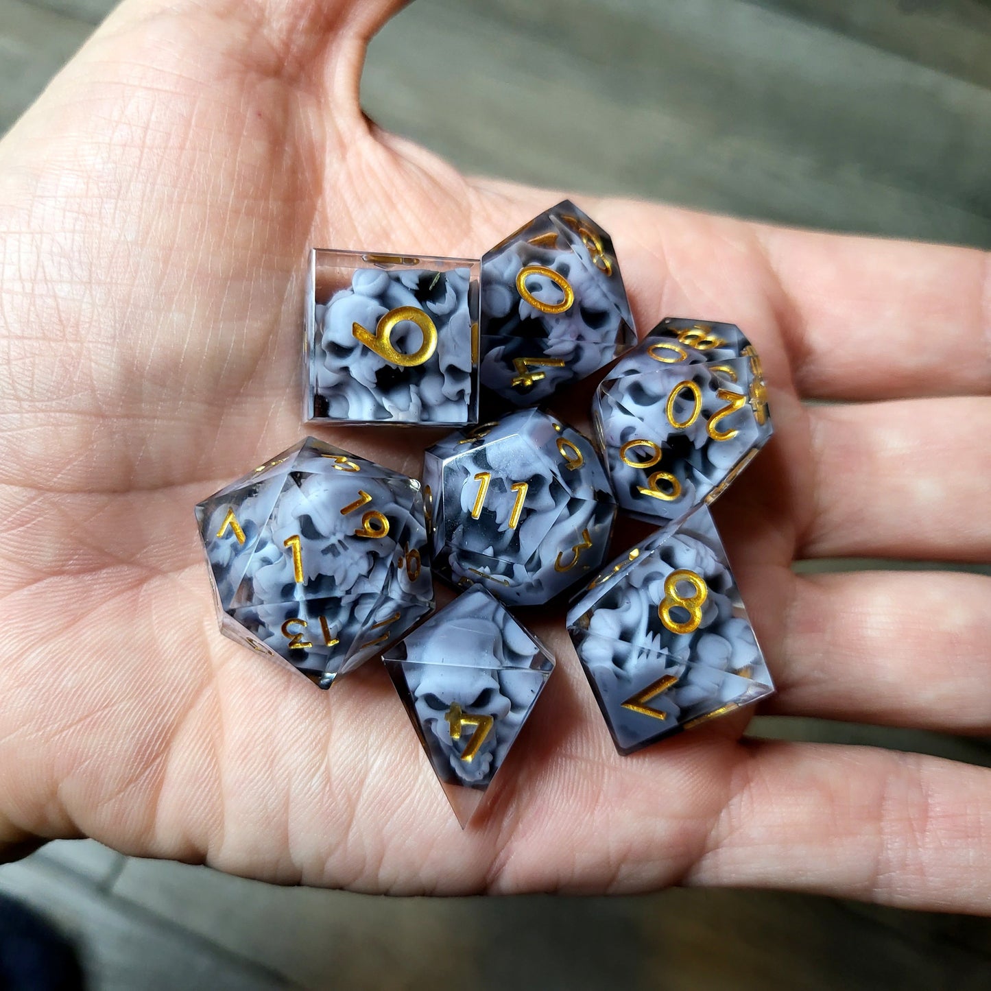 Dice set with 7 pieces with skull inside in spirit theme for role-playing games for Dungeons and Dragons