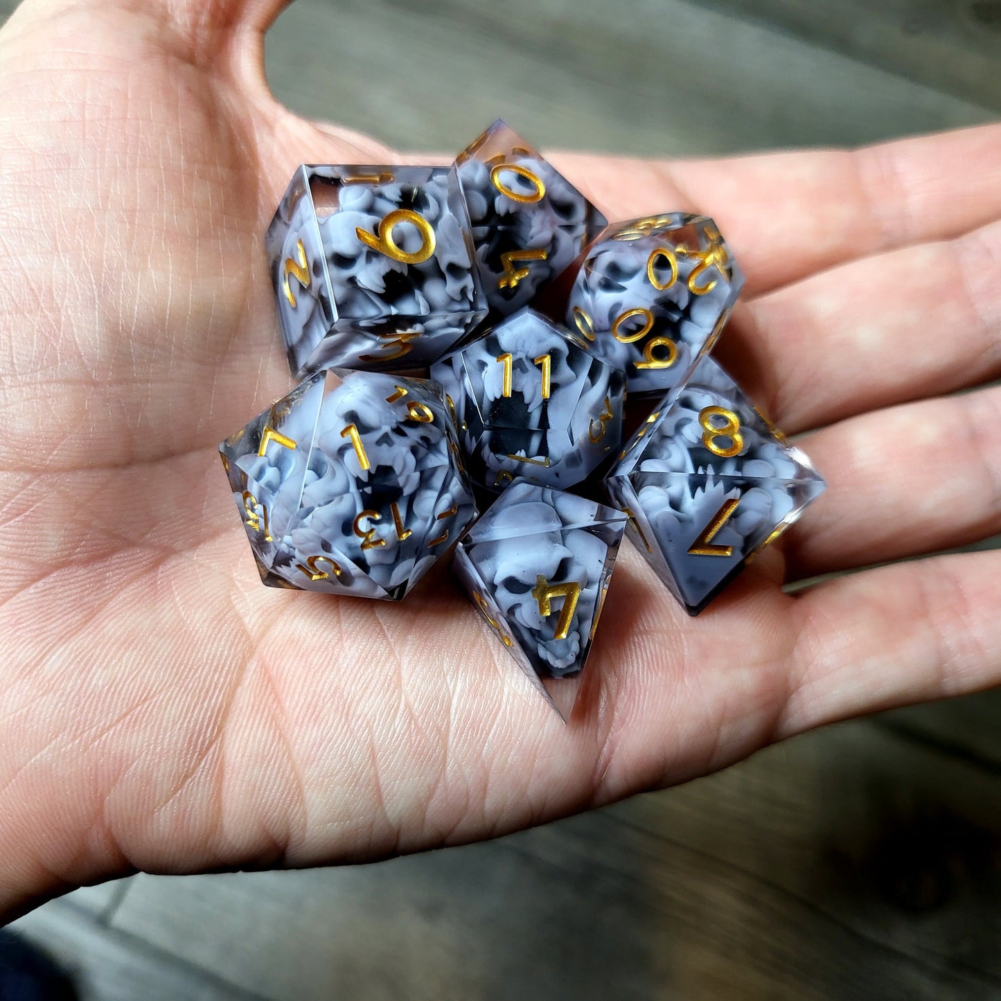 Dice set with 7 pieces with skull inside in spirit theme for role-playing games for Dungeons and Dragons