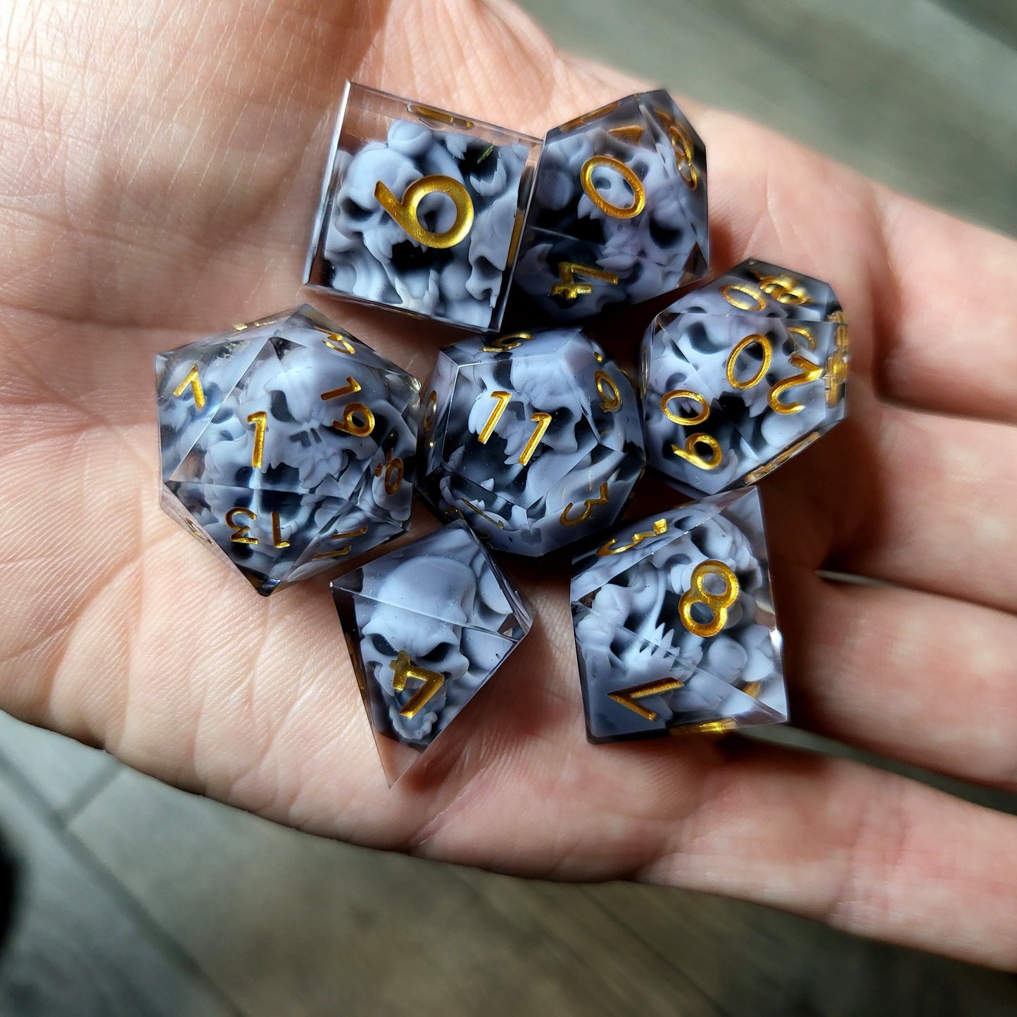 Dice set with 7 pieces with skull inside in spirit theme for role-playing games for Dungeons and Dragons