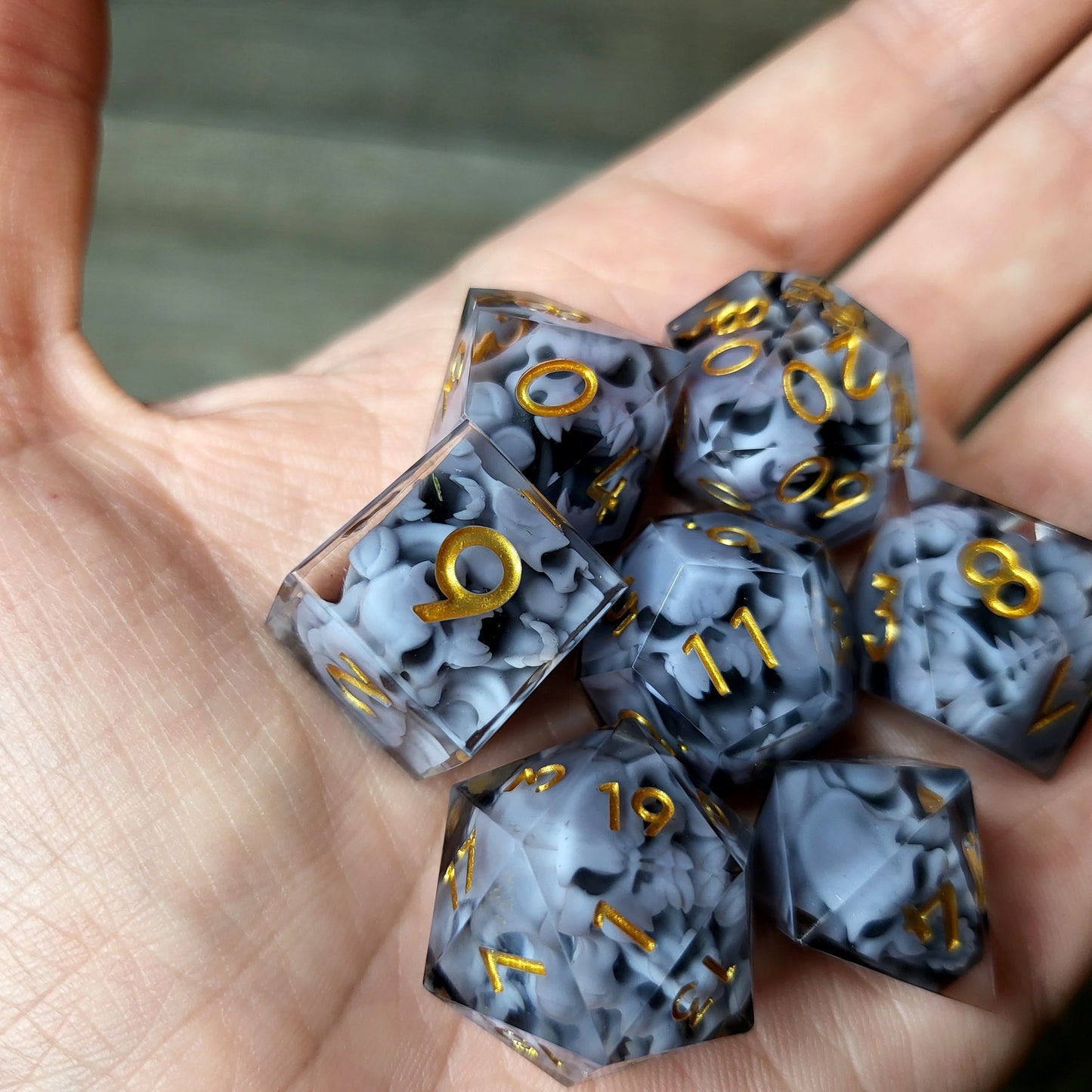 Dice set with 7 pieces with skull inside in spirit theme for role-playing games for Dungeons and Dragons