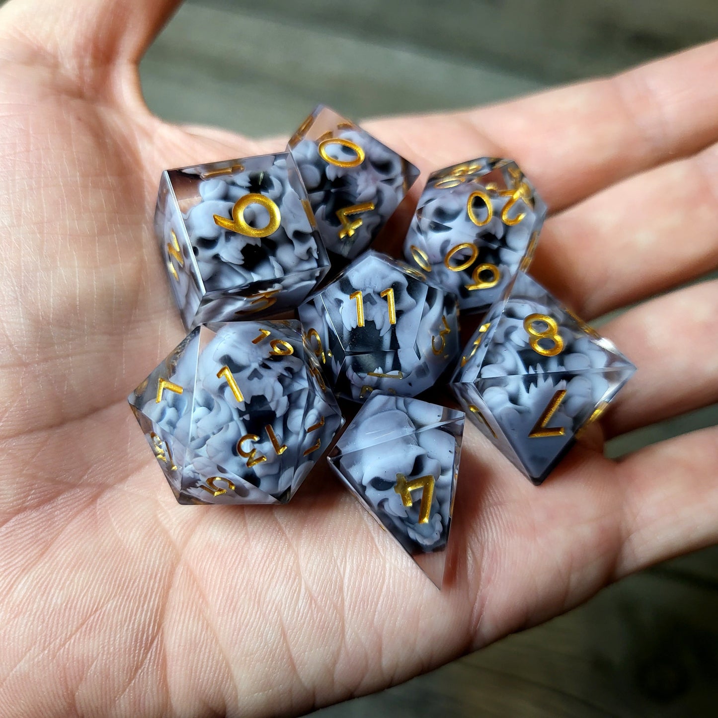Dice set with 7 pieces with skull inside in spirit theme for role-playing games for Dungeons and Dragons