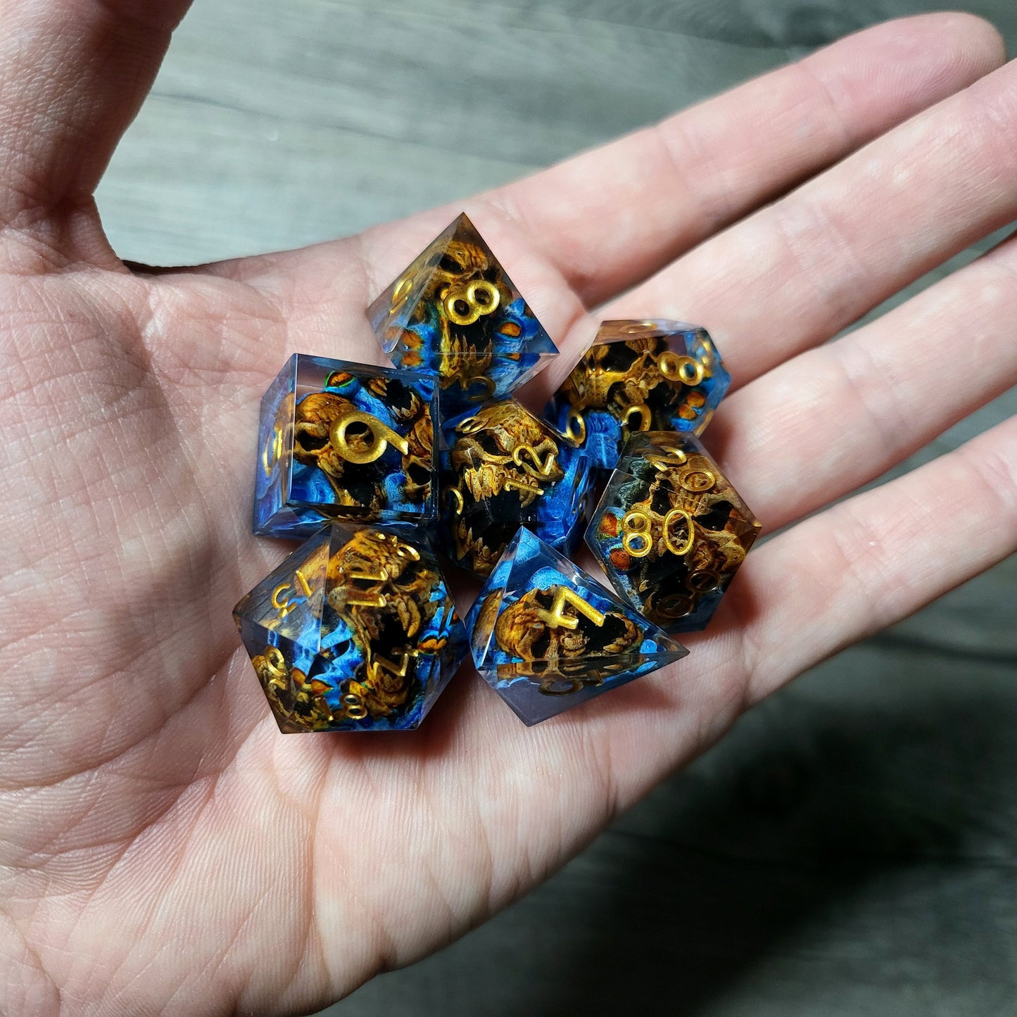 Dice set with 7 pieces with skull inside in spirit theme for role-playing games for Dungeons and Dragons