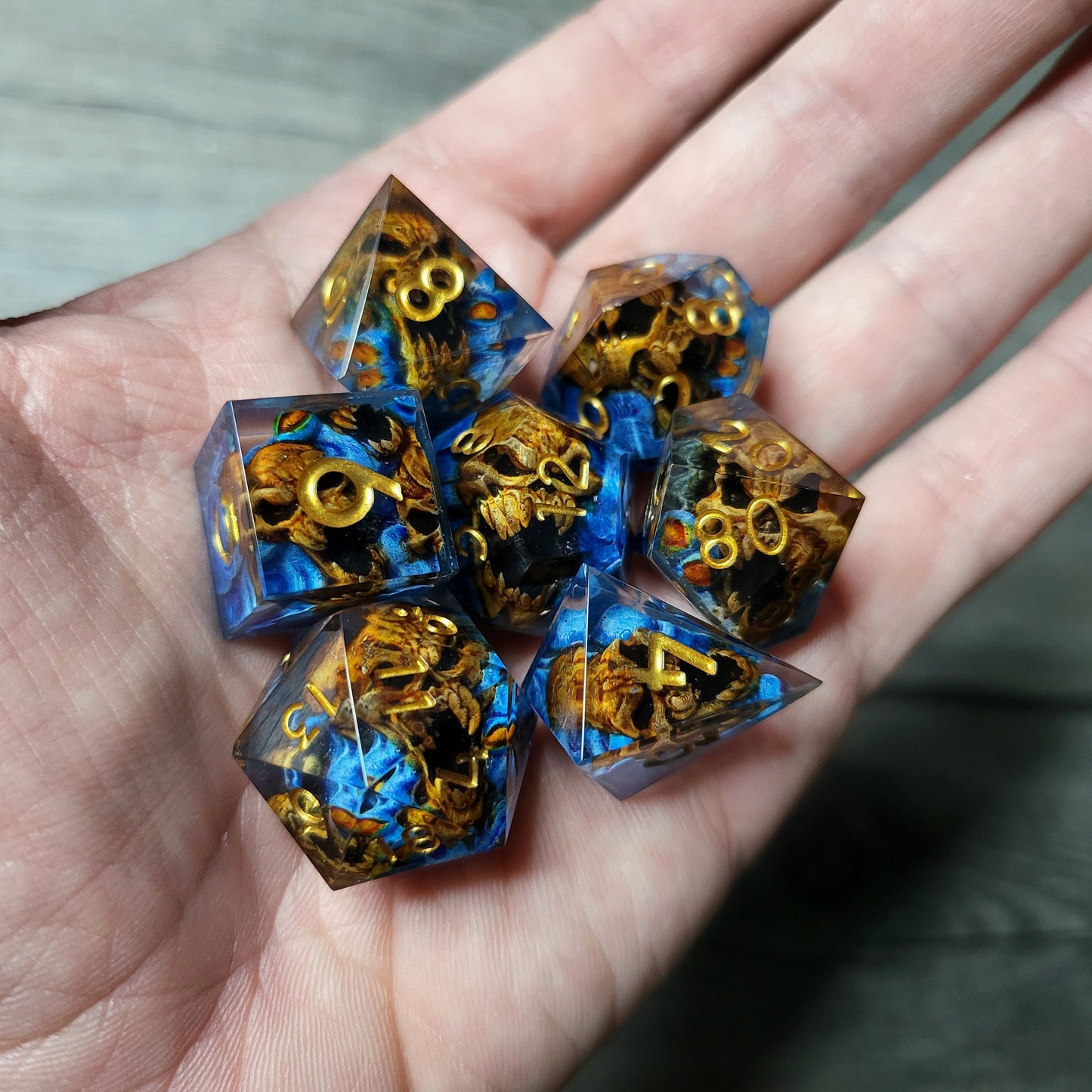 Dice set with 7 pieces with skull inside in spirit theme for role-playing games for Dungeons and Dragons