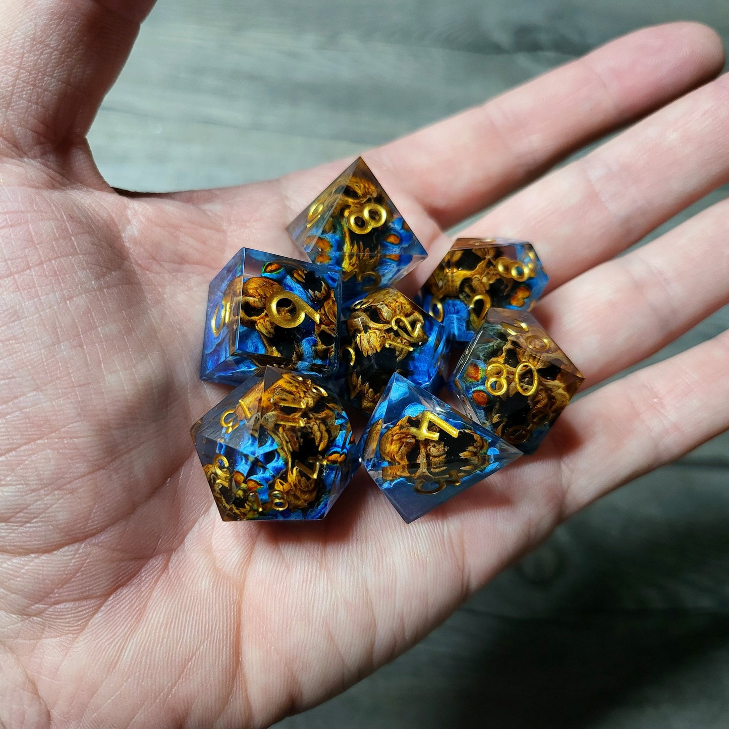 Dice set with 7 pieces with skull inside in spirit theme for role-playing games for Dungeons and Dragons