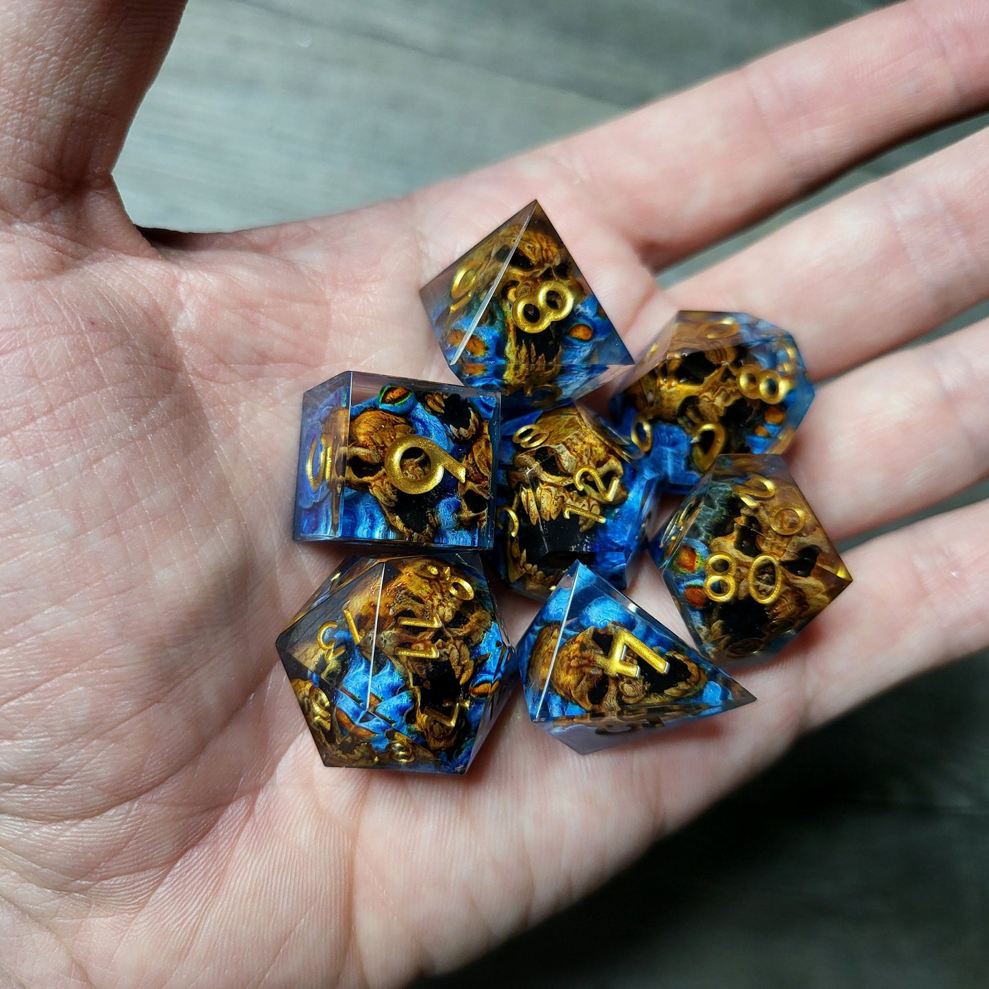 Dice set with 7 pieces with skull inside in spirit theme for role-playing games for Dungeons and Dragons