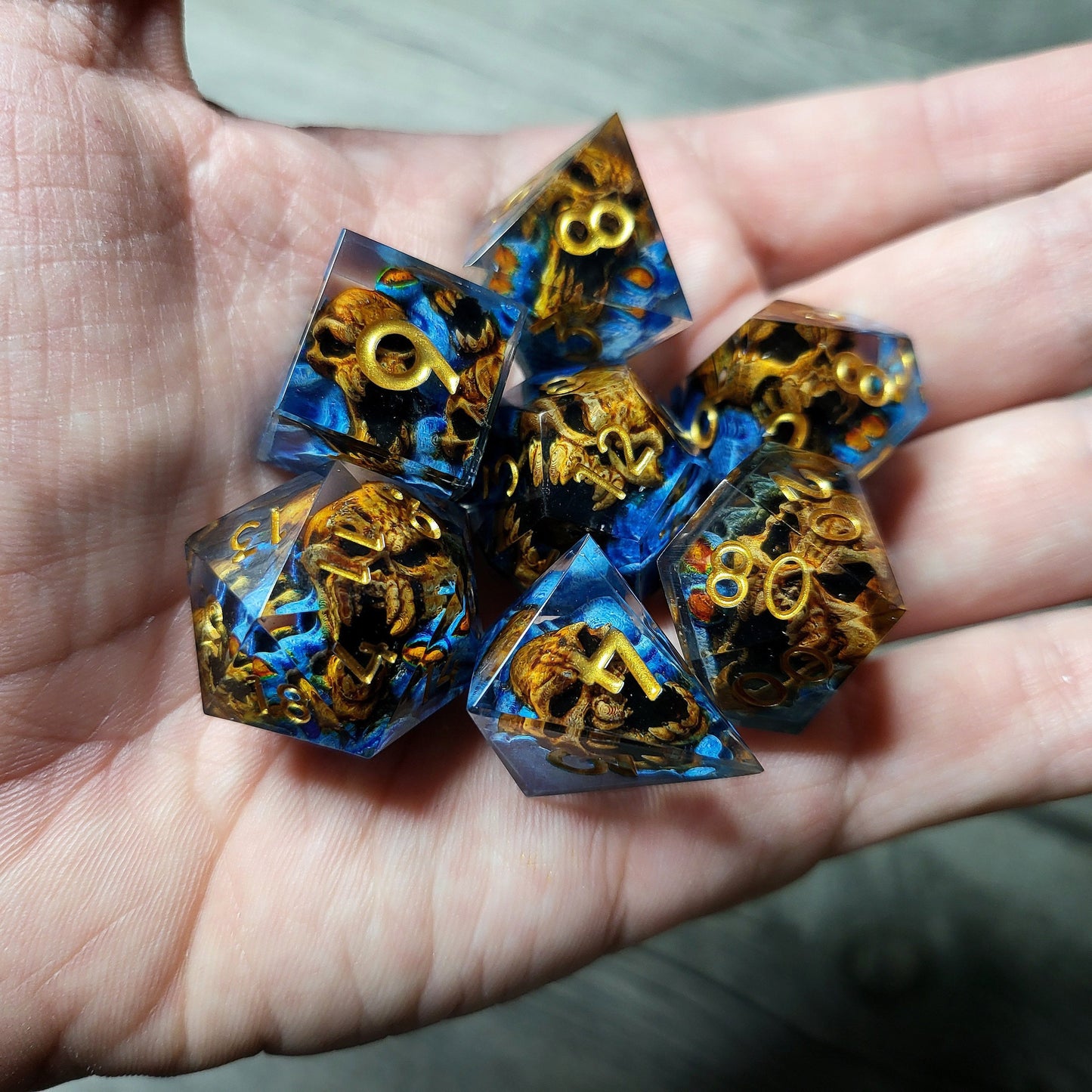 Dice set with 7 pieces with skull inside in spirit theme for role-playing games for Dungeons and Dragons