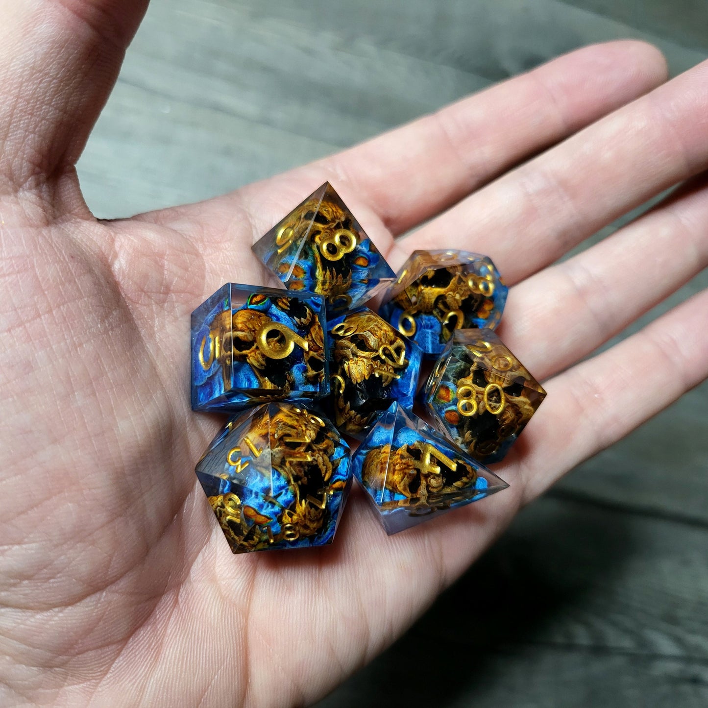Dice set with 7 pieces with skull inside in spirit theme for role-playing games for Dungeons and Dragons