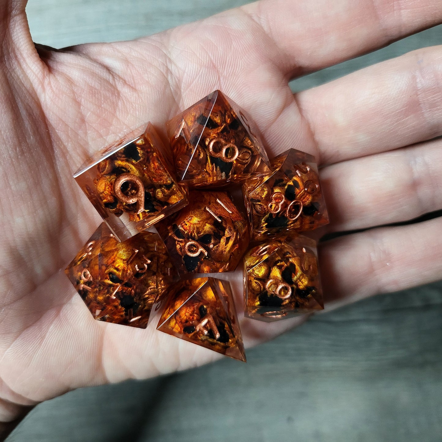 Dice set with 7 pieces with skull inside in spirit theme for role-playing games for Dungeons and Dragons