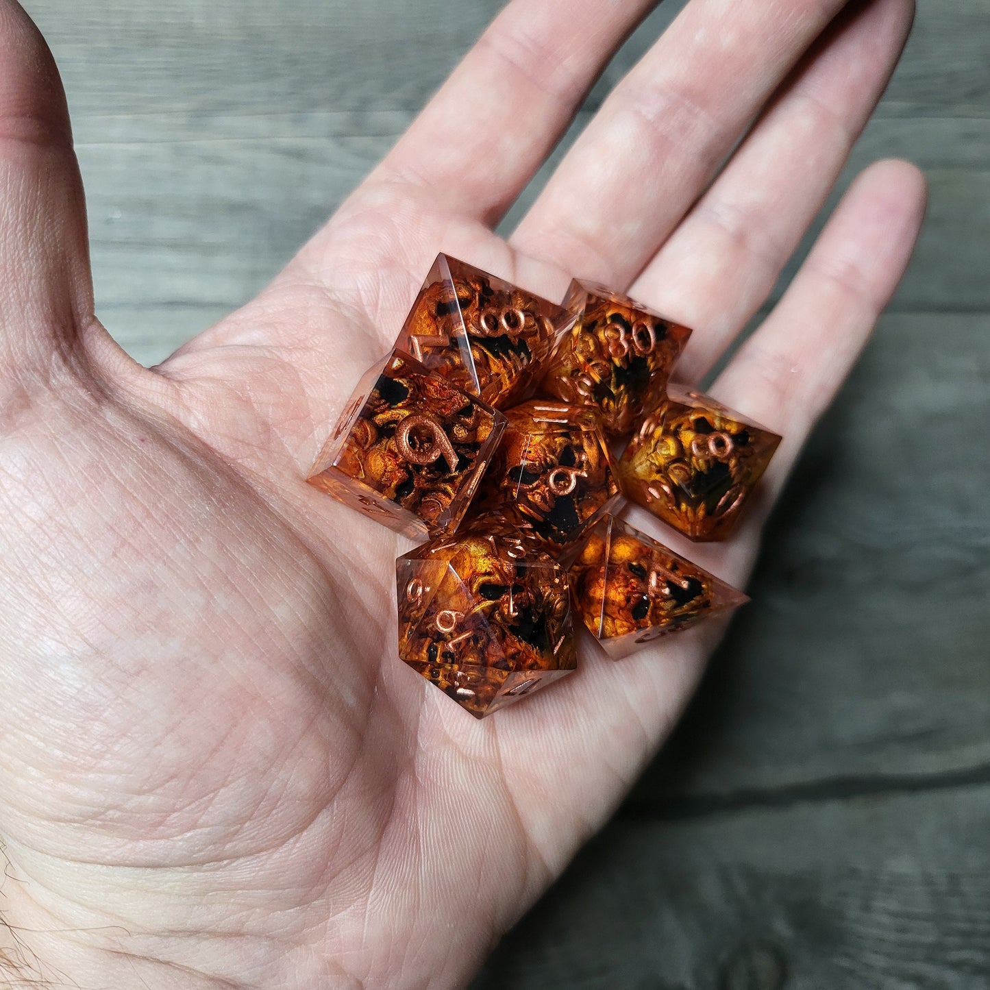 Dice set with 7 pieces with skull inside in spirit theme for role-playing games for Dungeons and Dragons