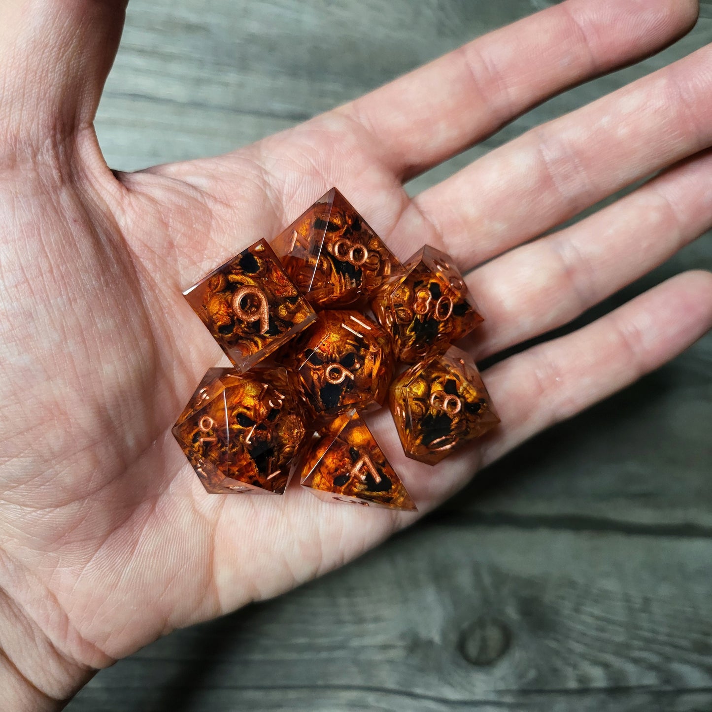Dice set with 7 pieces with skull inside in spirit theme for role-playing games for Dungeons and Dragons