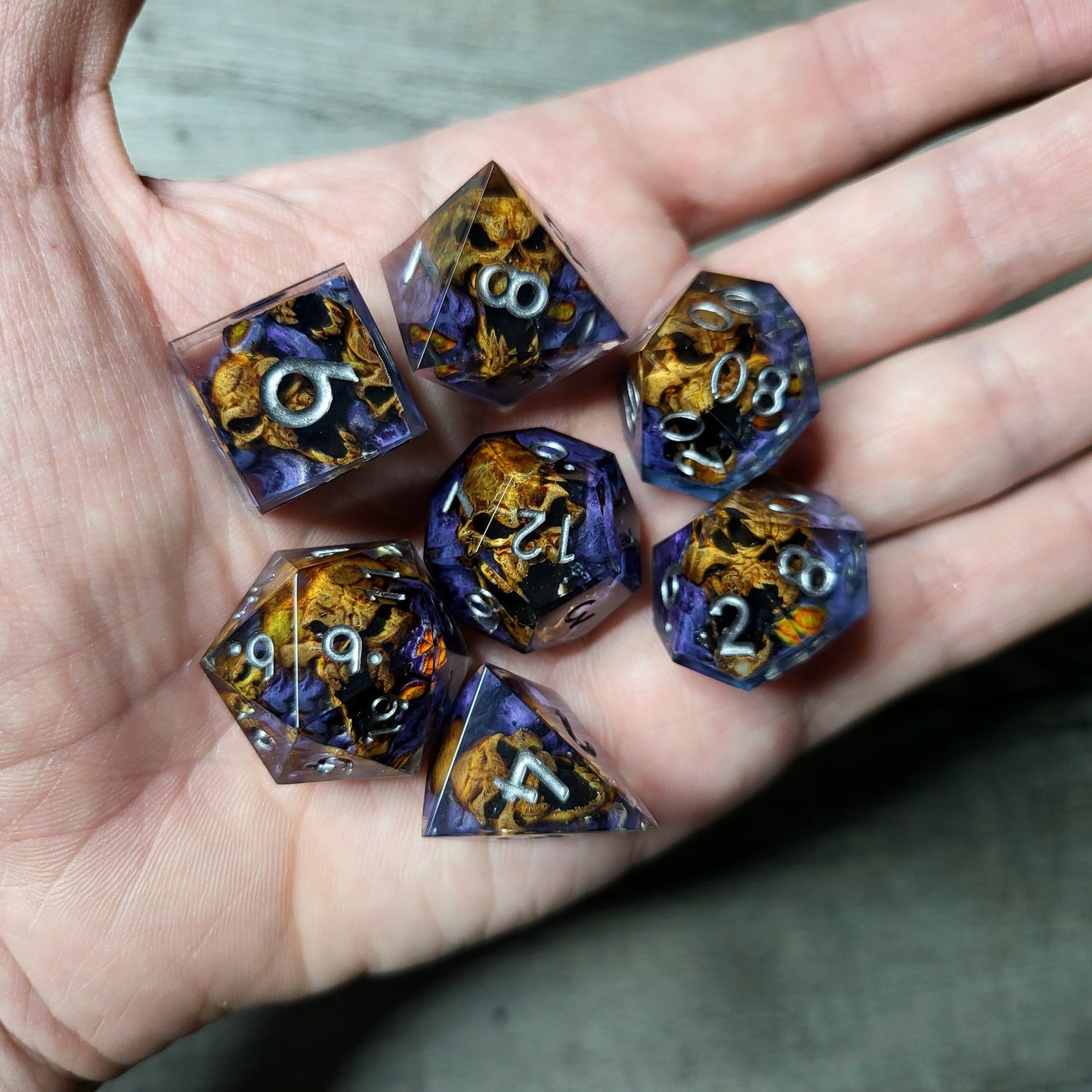 Dice set with 7 pieces with skull inside in spirit theme for role-playing games for Dungeons and Dragons
