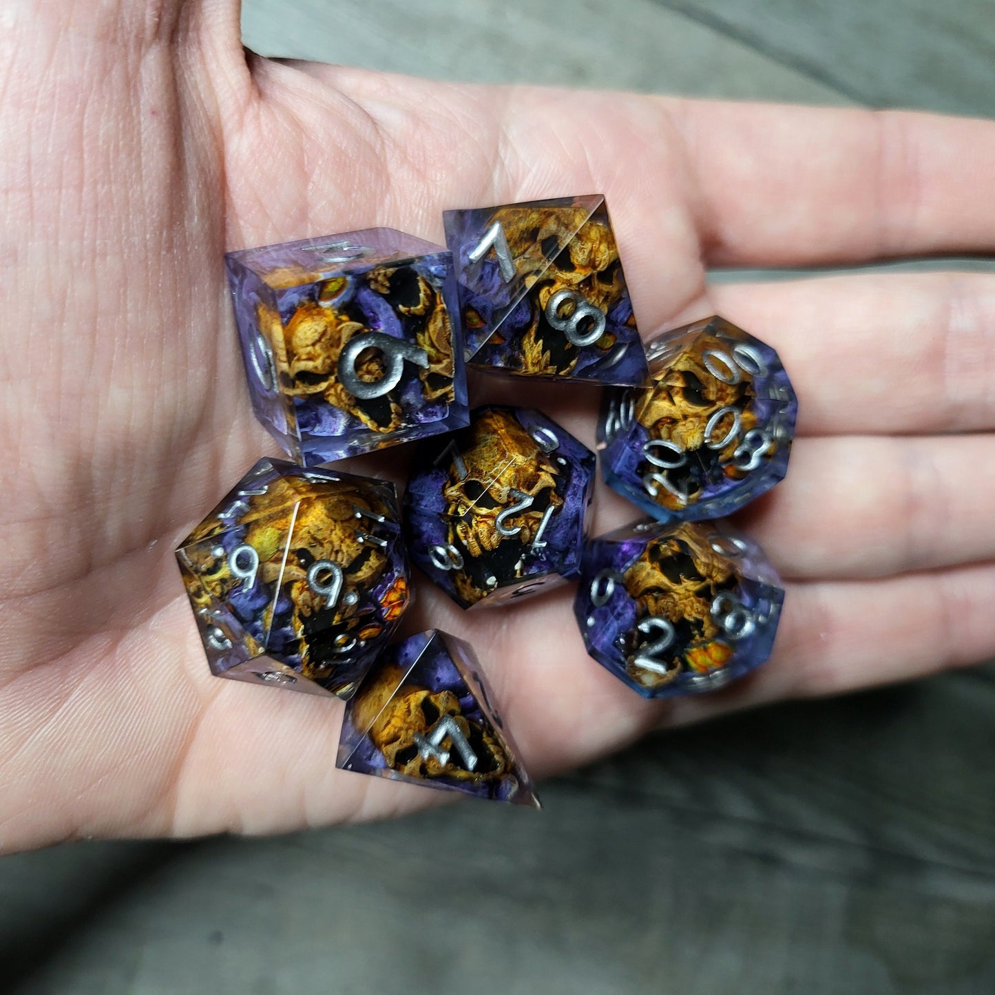 Dice set with 7 pieces with skull inside in spirit theme for role-playing games for Dungeons and Dragons