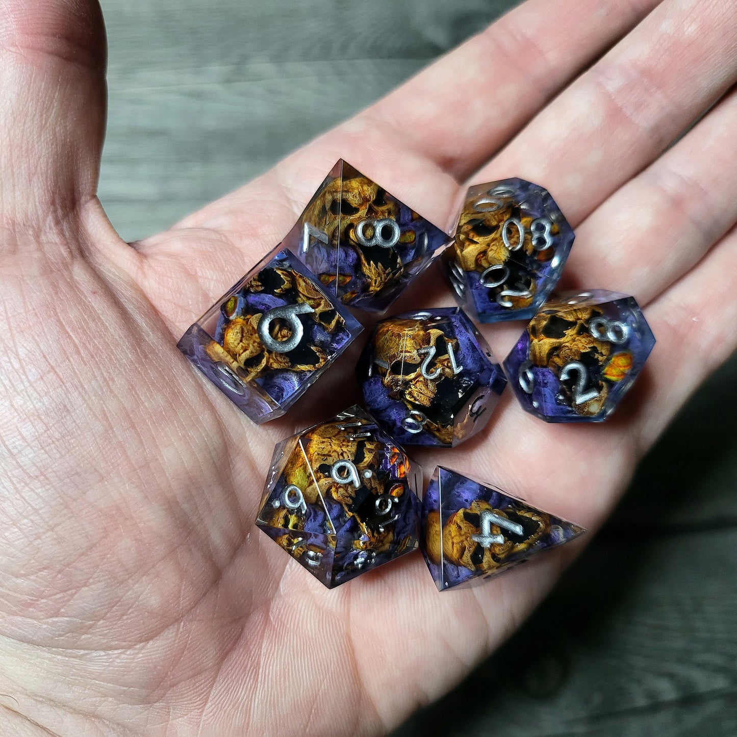 Dice set with 7 pieces with skull inside in spirit theme for role-playing games for Dungeons and Dragons