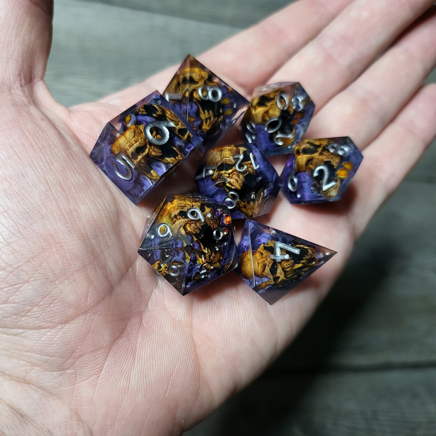 Dice set with 7 pieces with skull inside in spirit theme for role-playing games for Dungeons and Dragons