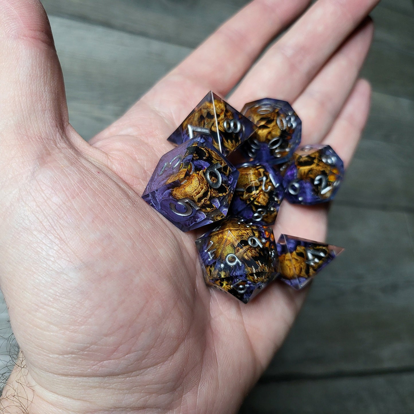 Dice set with 7 pieces with skull inside in spirit theme for role-playing games for Dungeons and Dragons